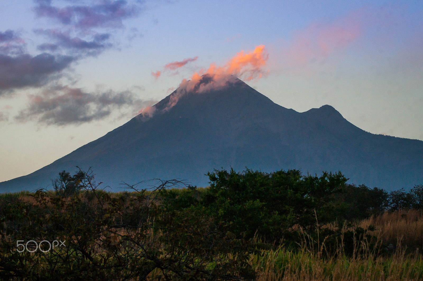 Sony Alpha DSLR-A380 sample photo. Clouds on the volcano at sunset photography
