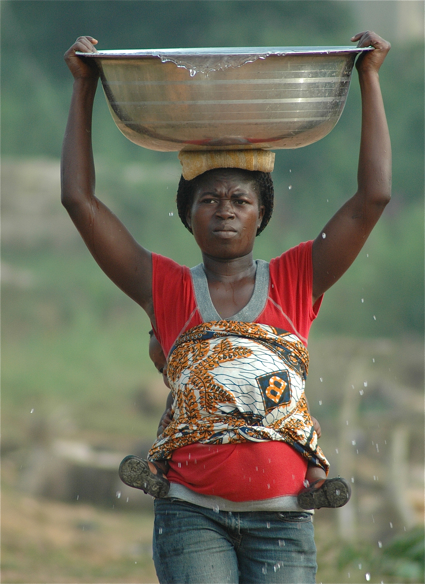 Nikon D70s + Tamron AF 70-300mm F4-5.6 Di LD Macro sample photo. Africa, west africa, ghana, mother, carrying water, water droplets, baby on back, baby feet,... photography