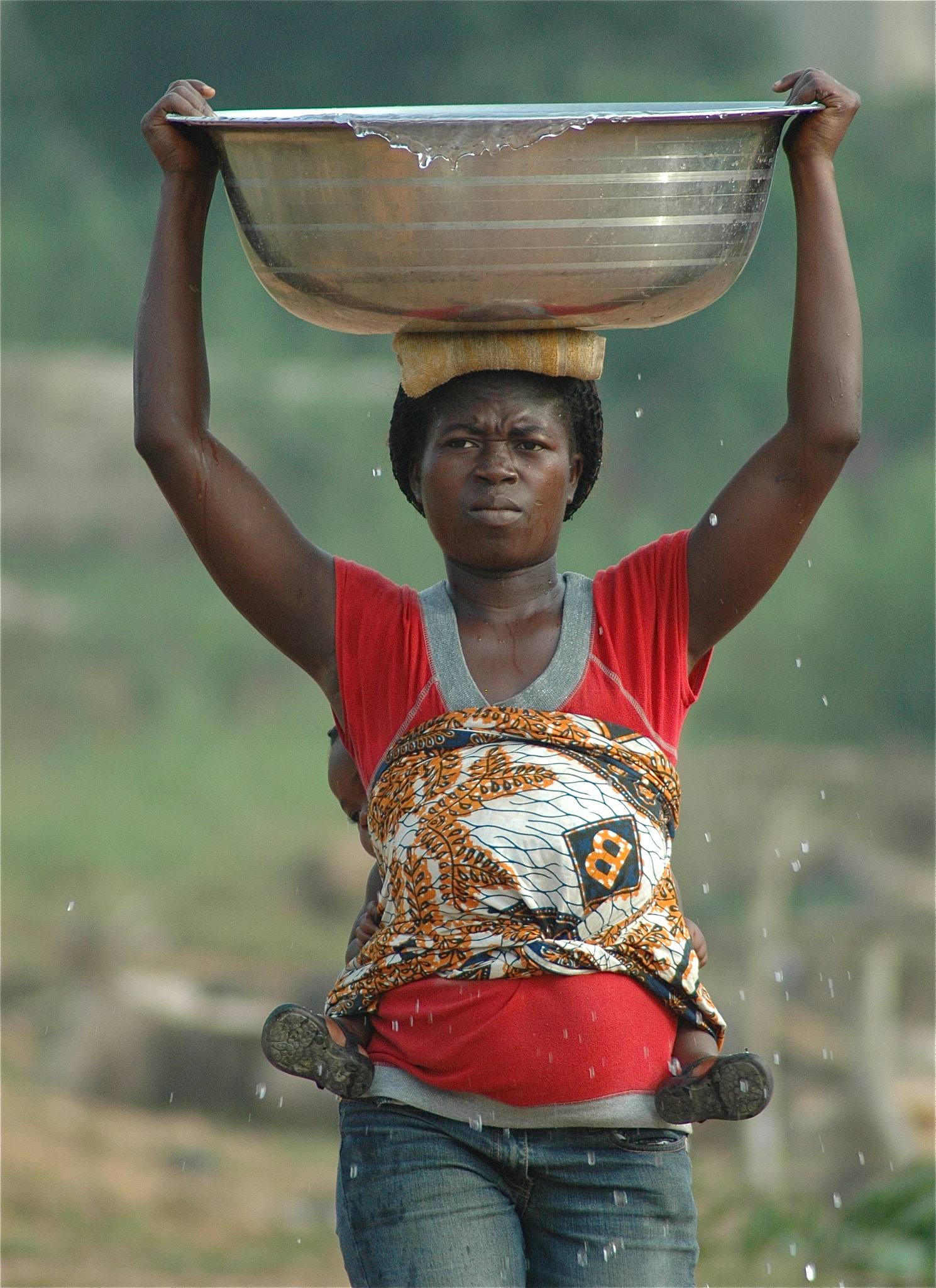 Nikon D70s sample photo. Africa, west africa, ghana, mother, carrying water, water droplets, baby on back, baby feet,... photography
