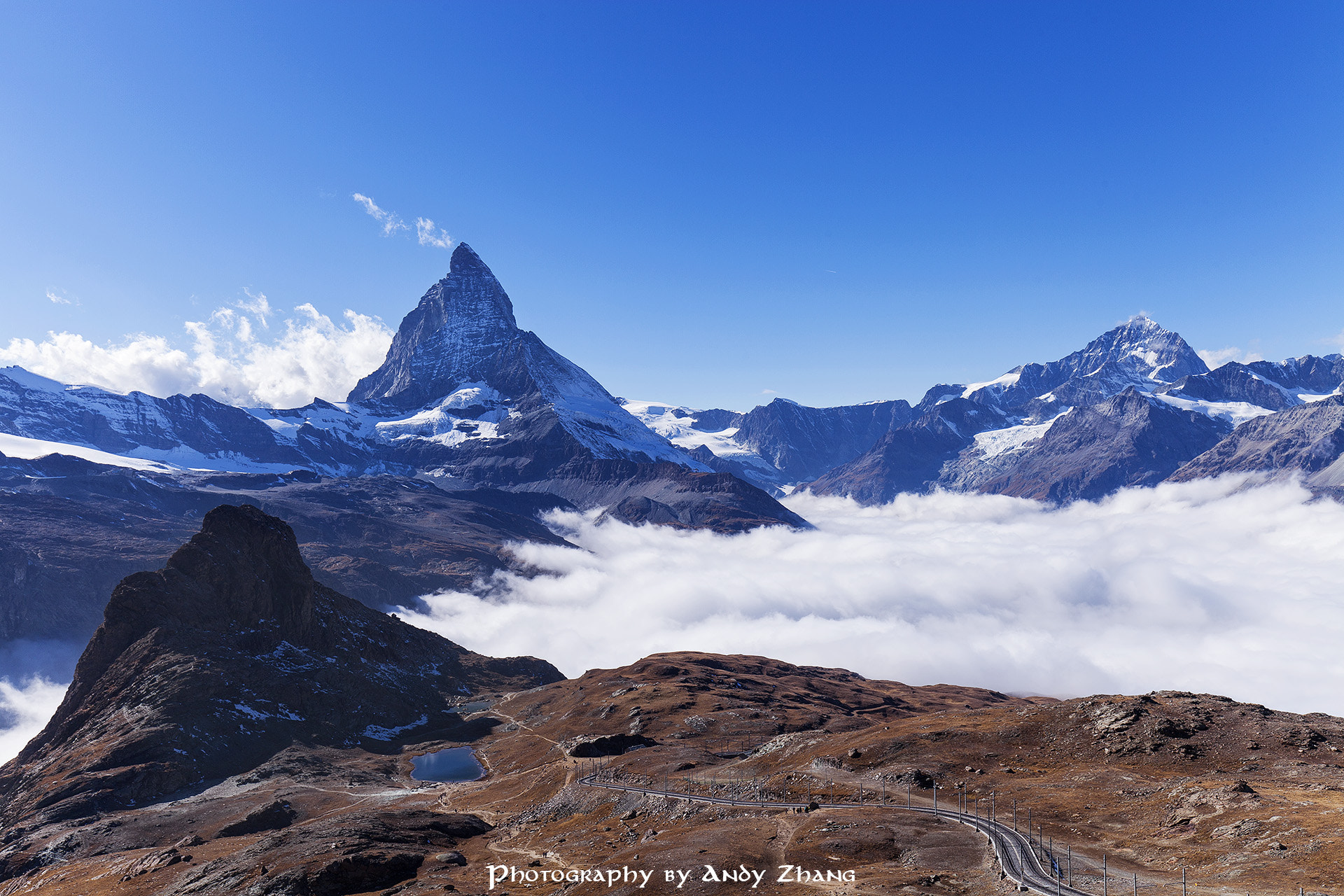 Canon EOS 5D Mark II + Canon EF 16-35mm F4L IS USM sample photo. The matterhorn above clouds photography