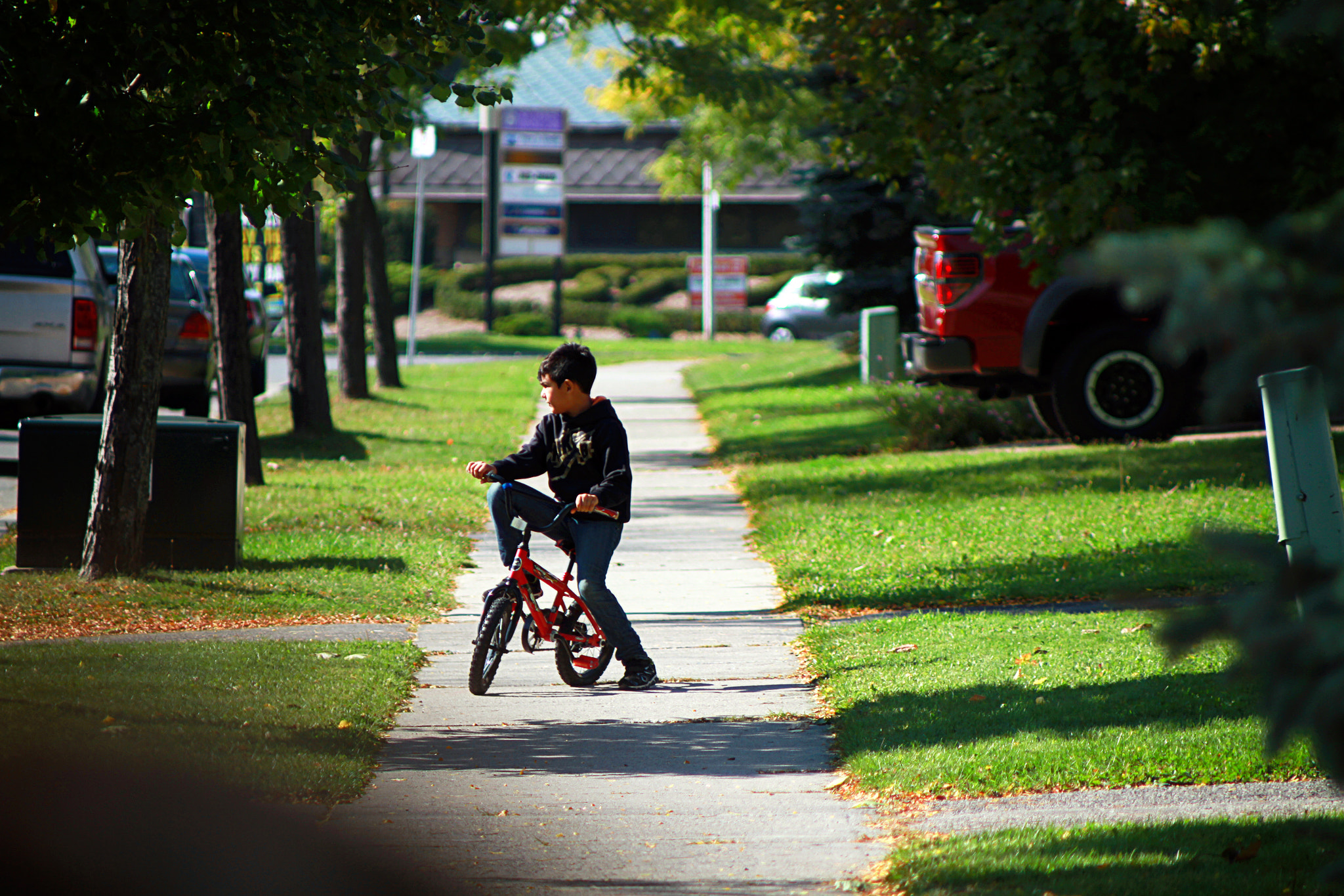 Canon EOS 7D + Canon EF 70-210mm f/4 sample photo. Boy with bicycle photography