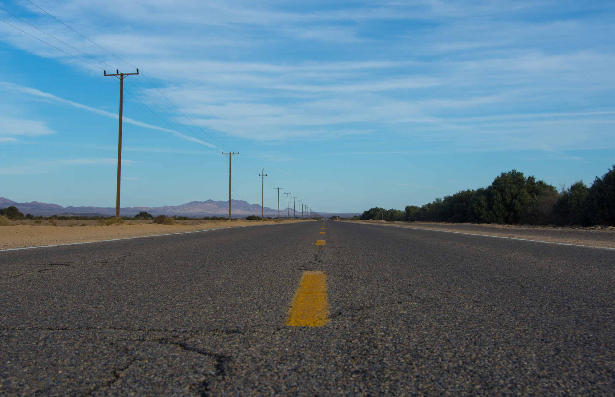 Nikon D7200 + Nikon AF-S DX Nikkor 18-55mm F3.5-5.6G II sample photo. Open road photography