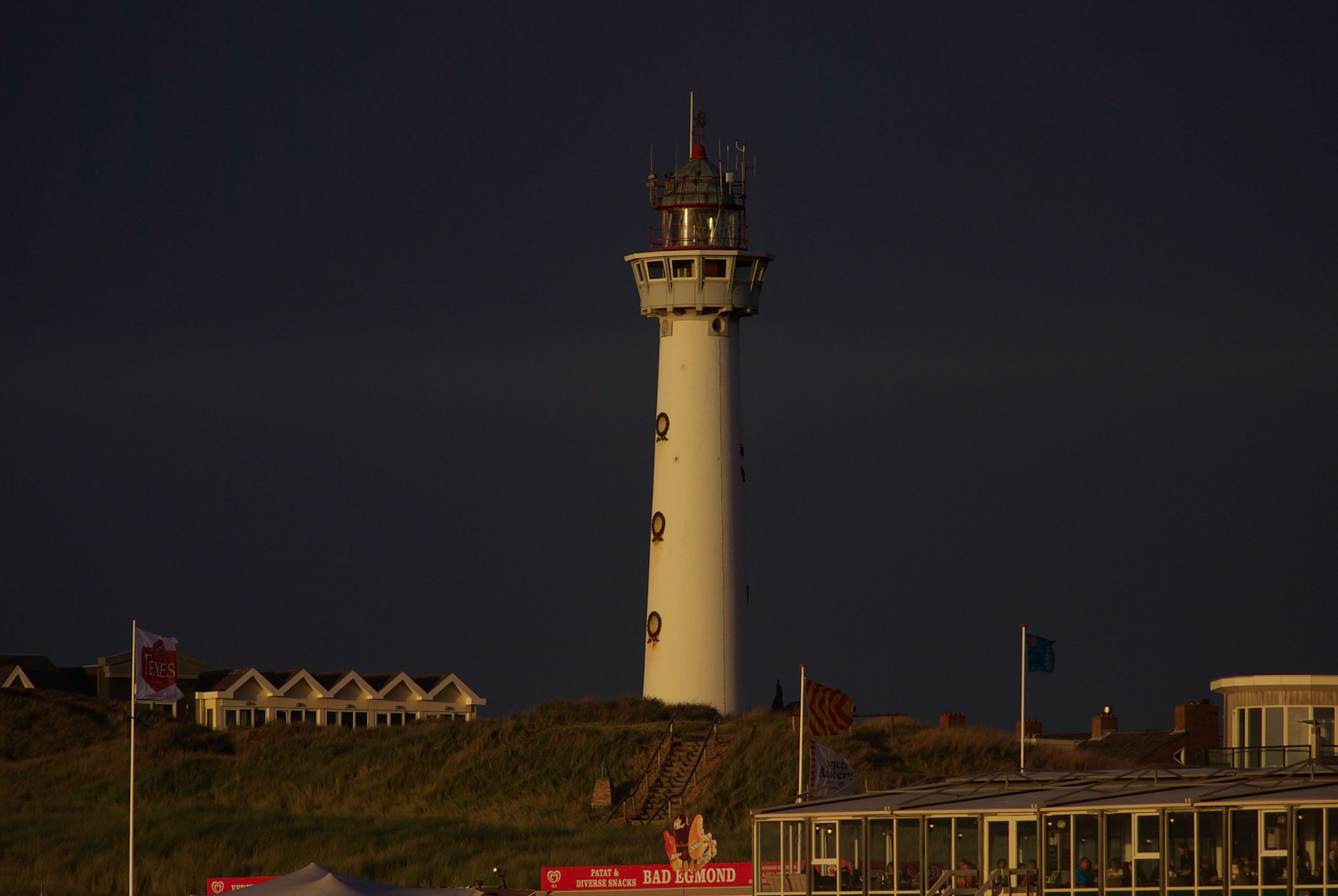 Pentax K10D sample photo. J.c.j. van speijk lighthouse as the night is near photography