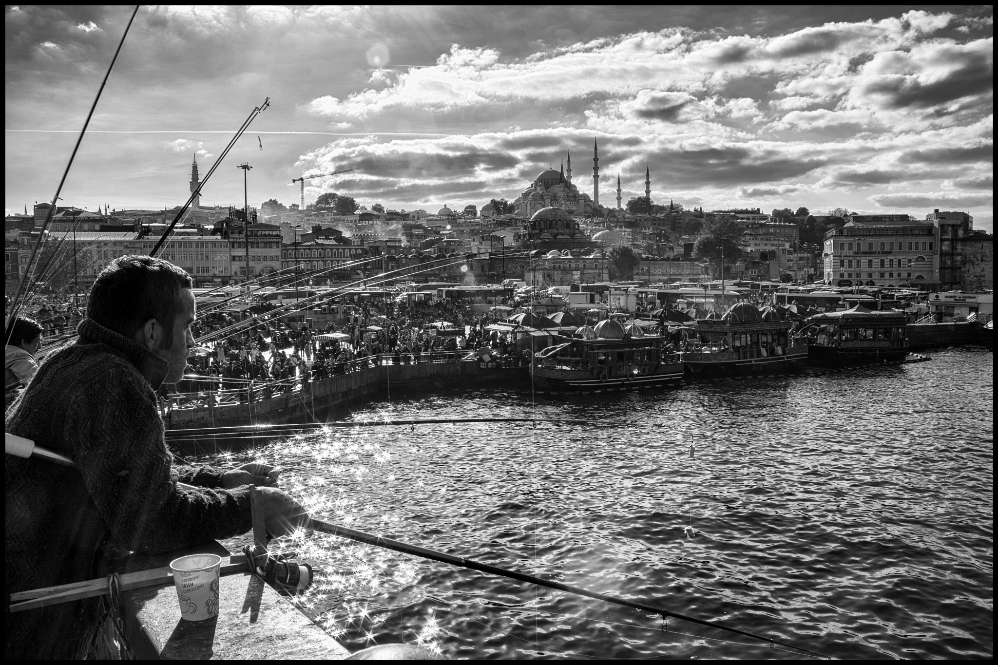 Canon EF 28-135mm F3.5-5.6 IS USM sample photo. Fishing and watching istanbul...... photography