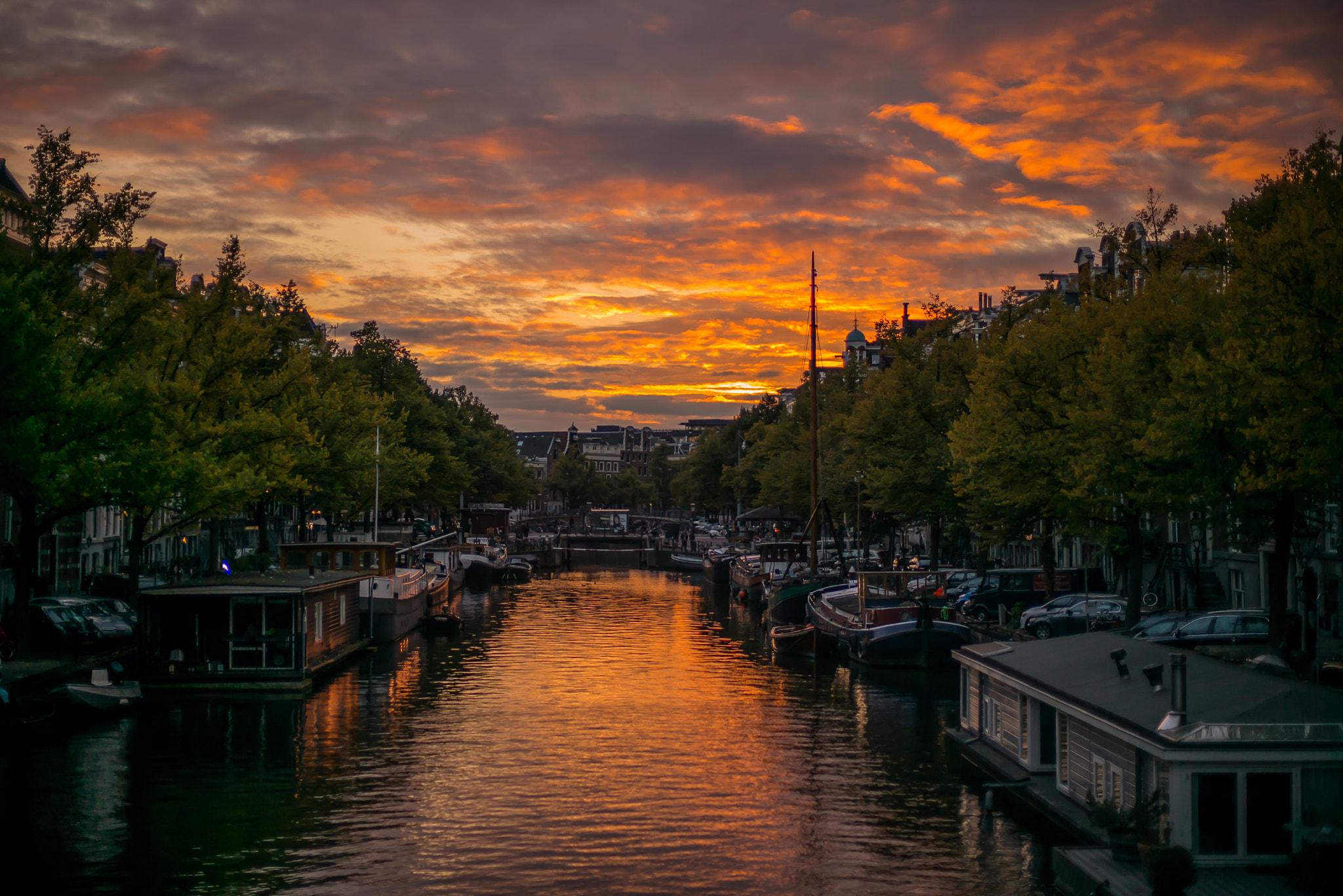 Leica M (Typ 240) + Leica Noctilux-M 50mm F0.95 ASPH sample photo. Sunset over the canals in amsterdam photography