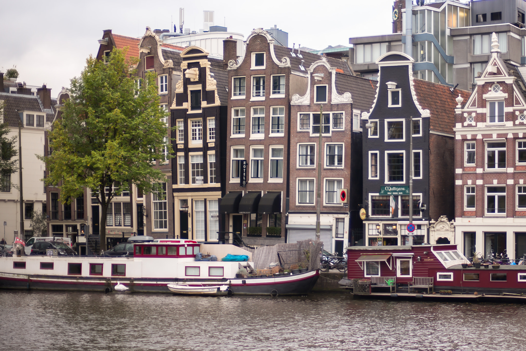Leica Noctilux-M 50mm F0.95 ASPH sample photo. The leaning canal house of amsterdam photography