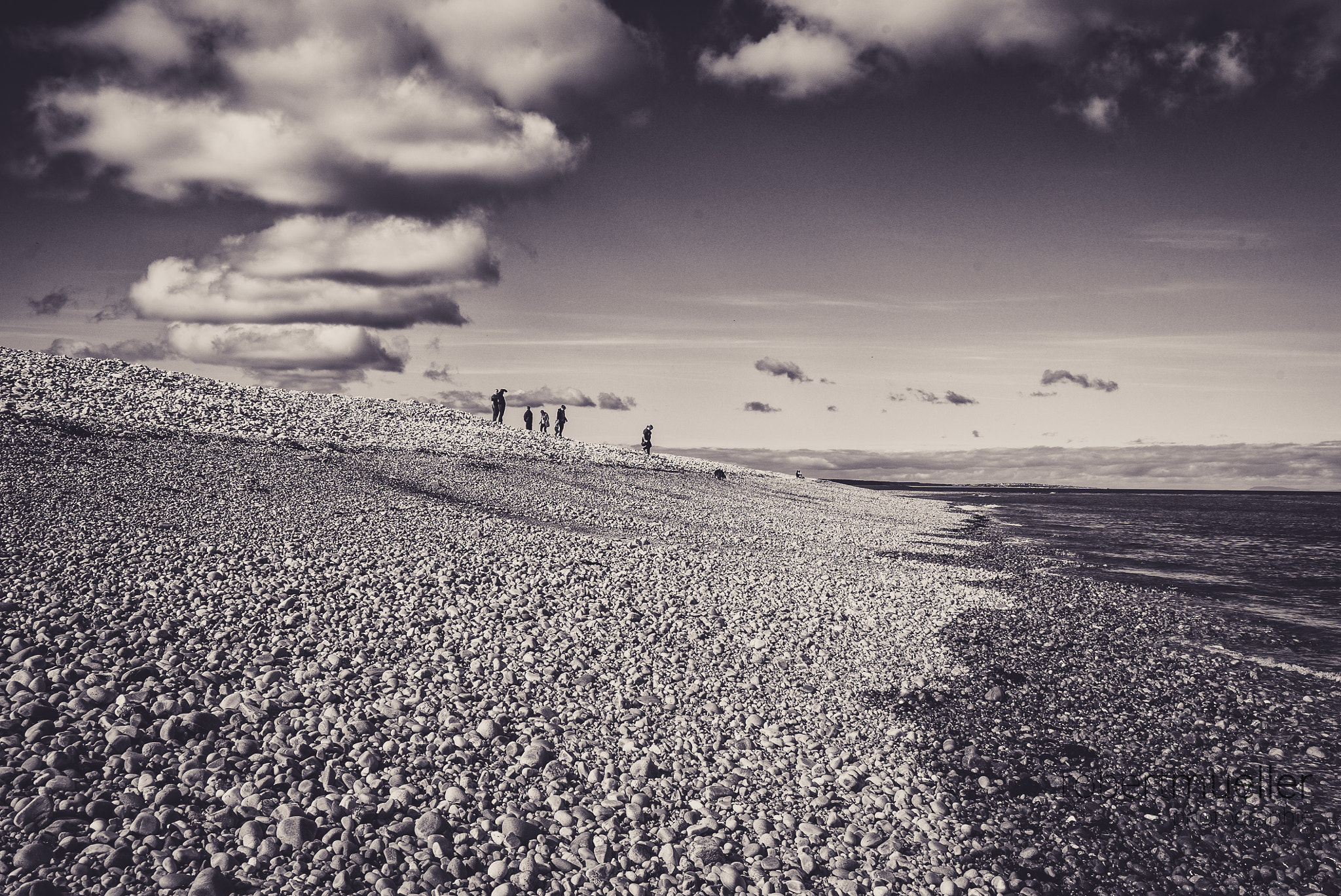 Sony FE PZ 28-135mm F4 G OSS sample photo. Stone beach photography