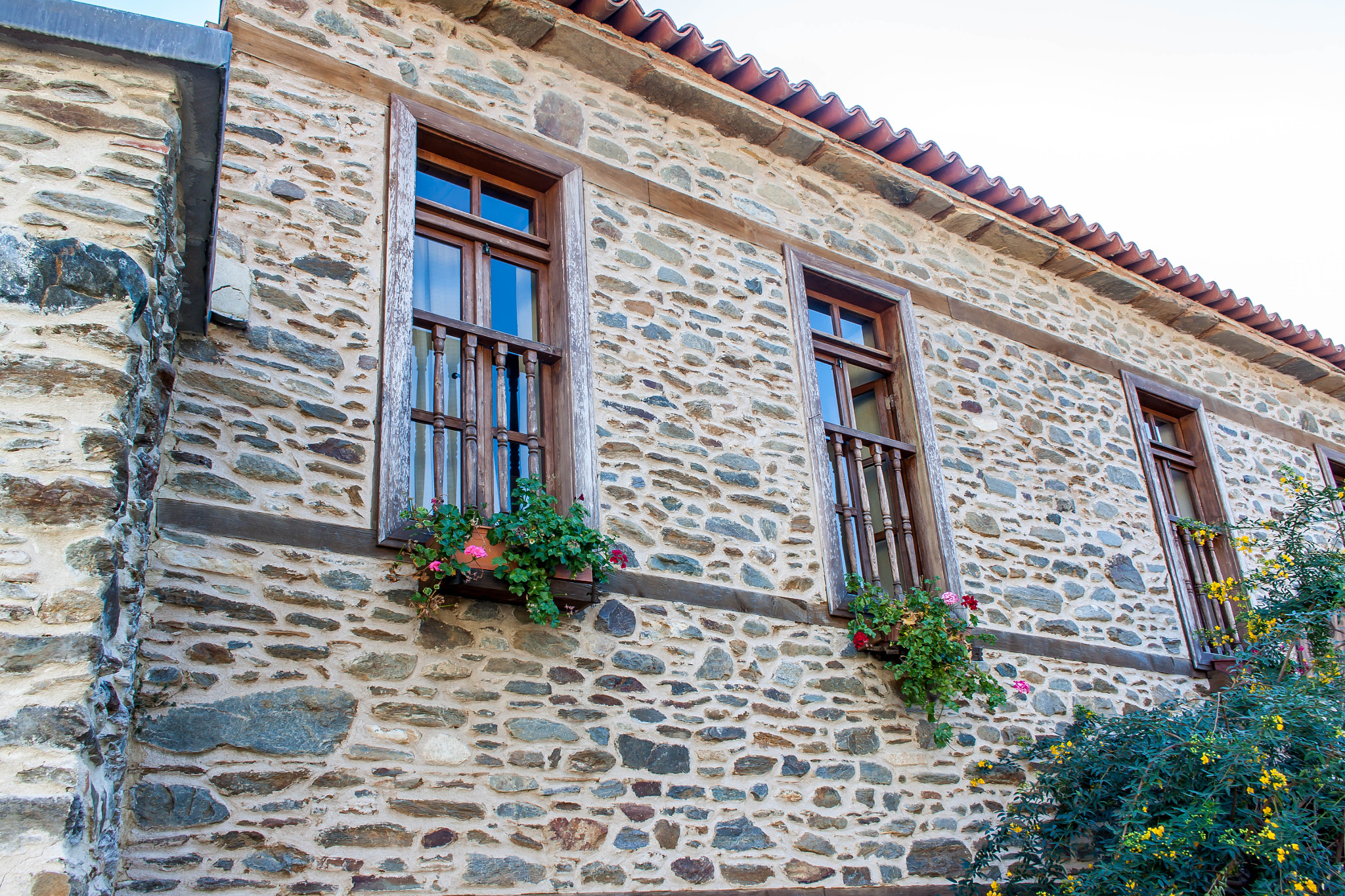 Canon EOS 50D sample photo. Stone houses photography