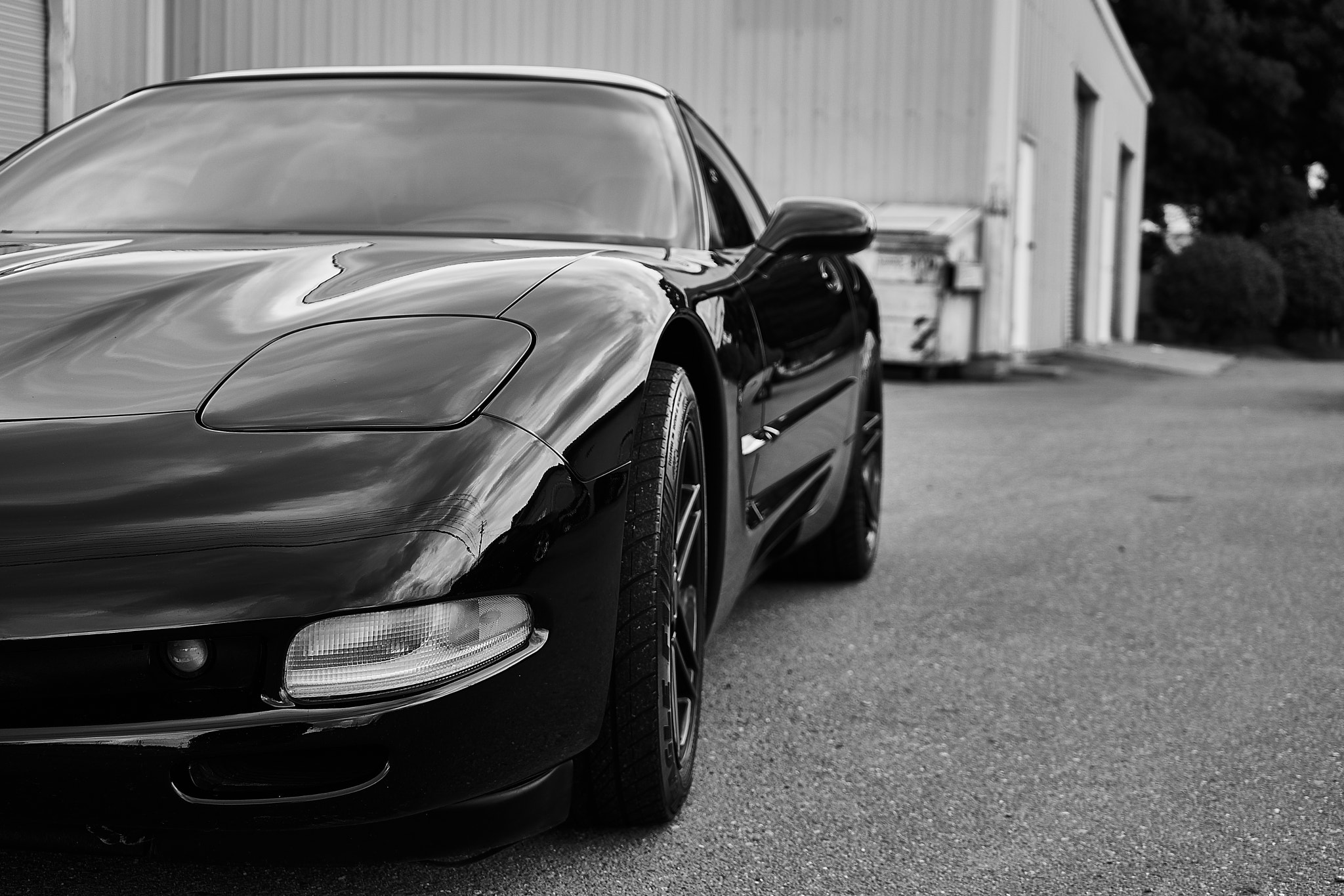 Sony FE 28-70mm F3.5-5.6 OSS sample photo. Black c5 corvette in black and white photography