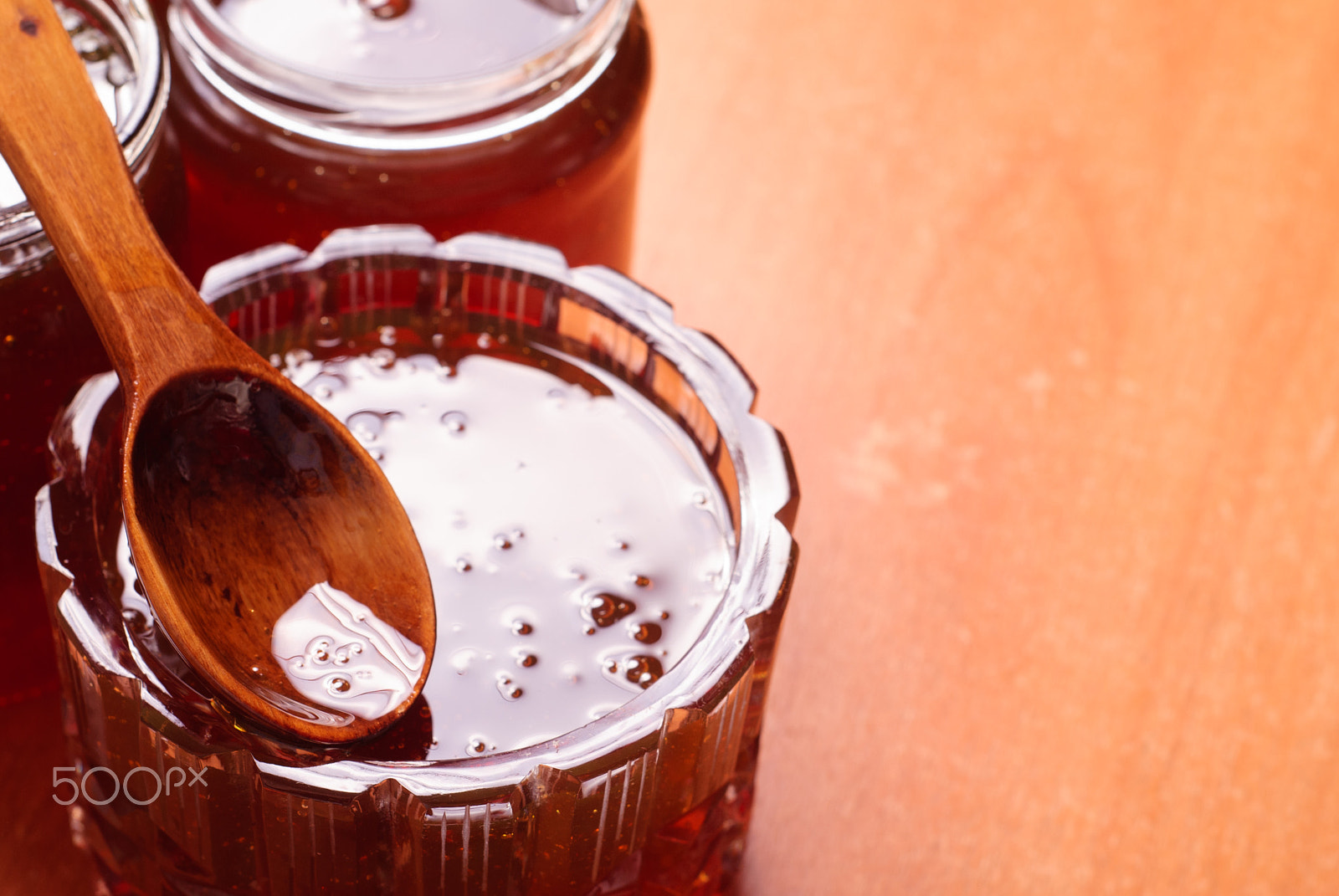 Nikon D80 sample photo. Honey in jars, a wooden spoon with honey, photography