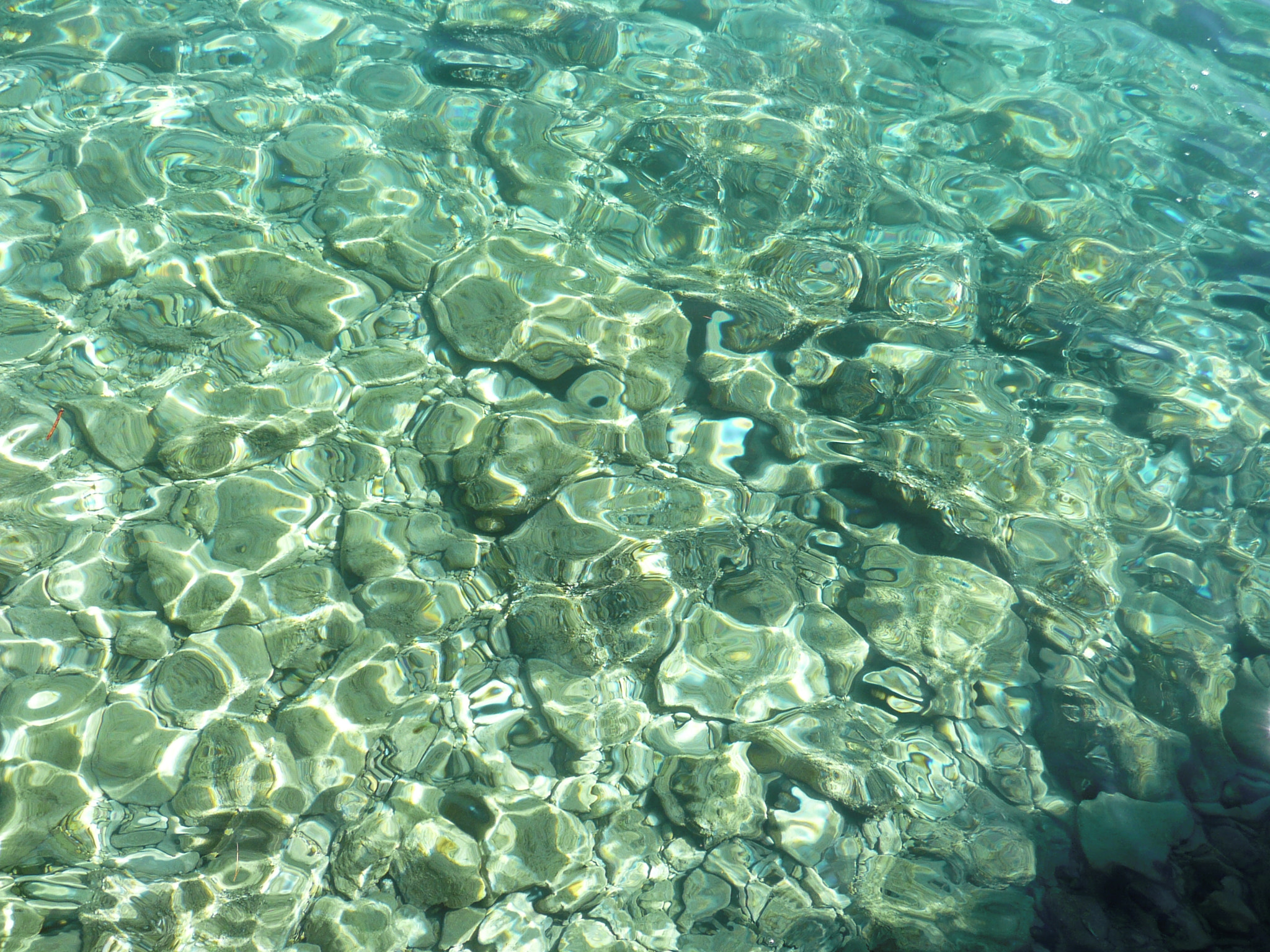 Panasonic DMC-TZ2 sample photo. Water reflections of adriatic sea photography