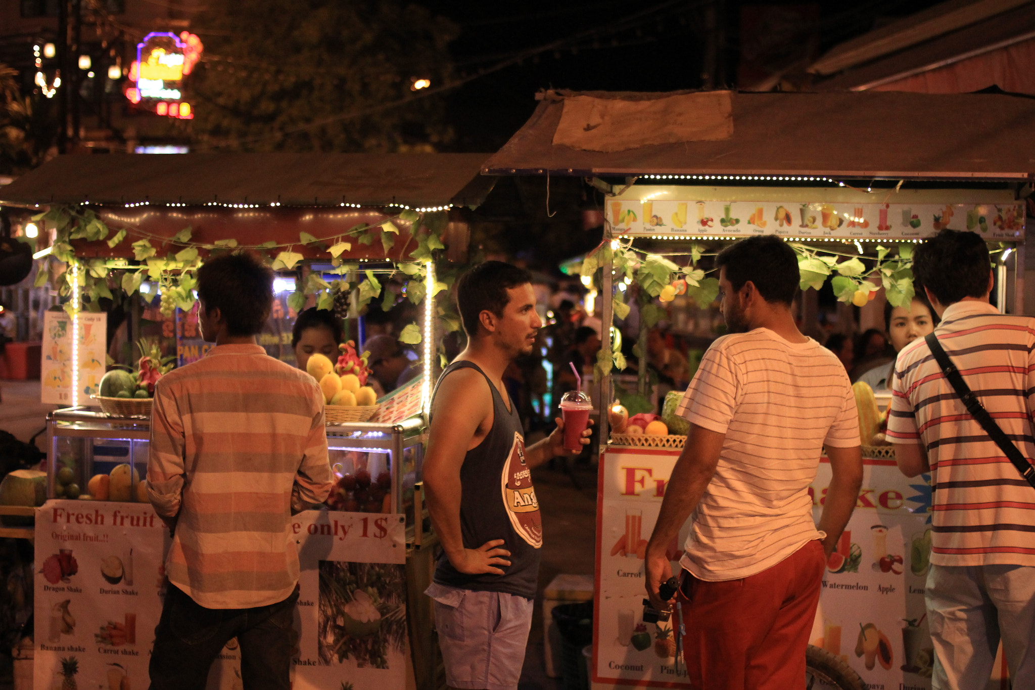 Canon EOS 60D + Canon EF 35mm F2 sample photo. Night market photography