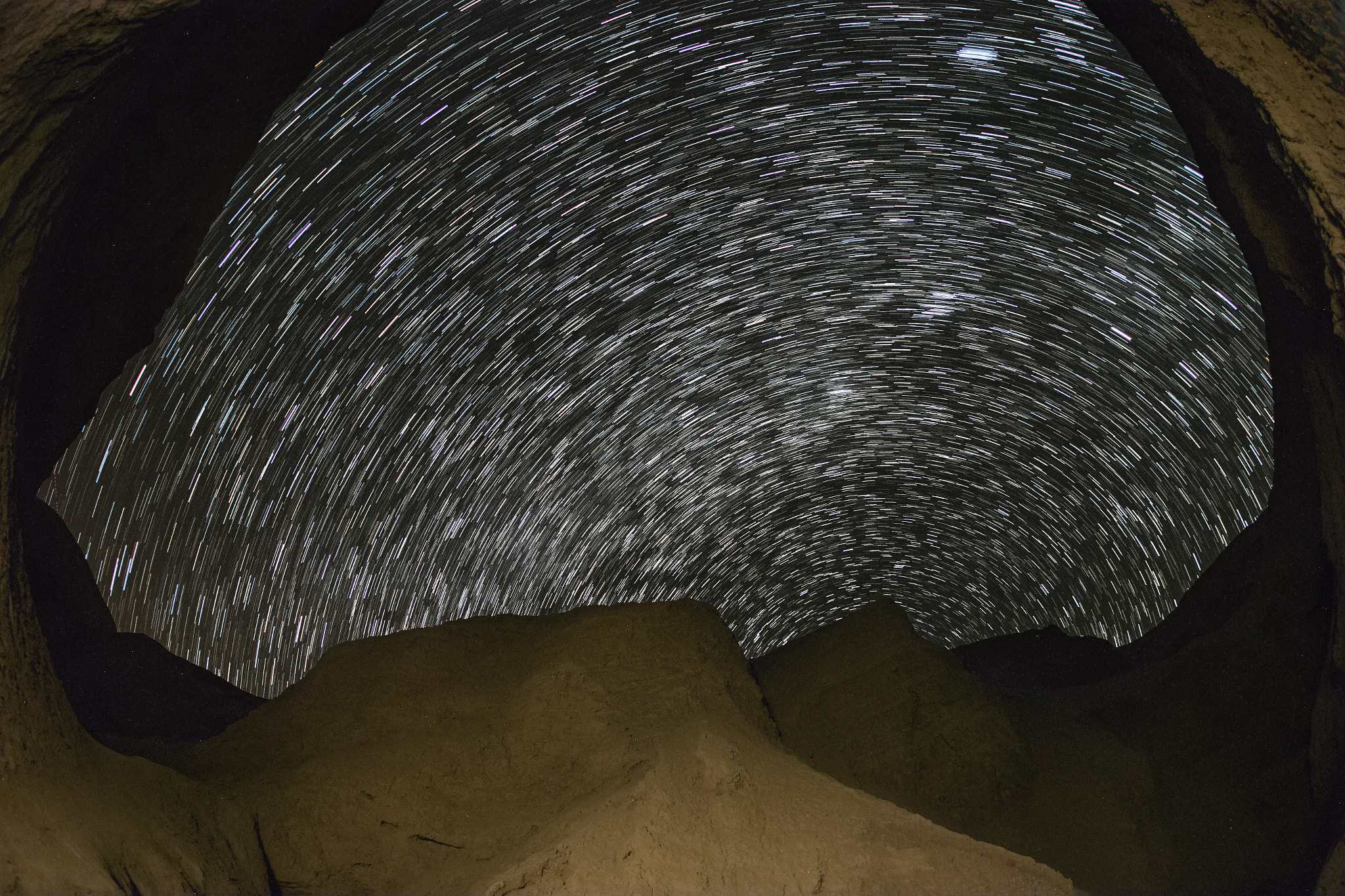 Sigma 15mm f/2.8 EX Fisheye sample photo. Star trails seen from the cave photography