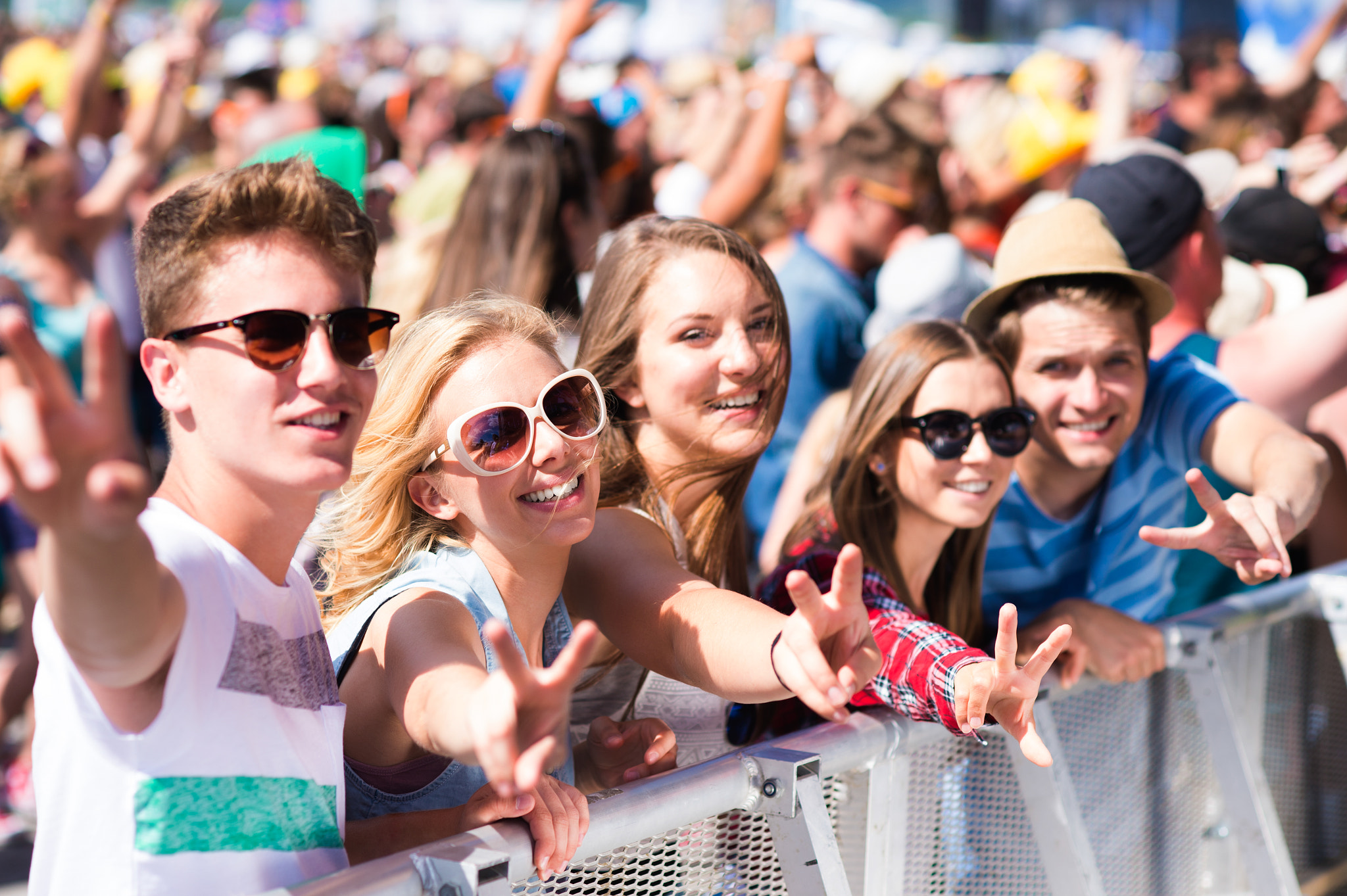 Nikon D4S + Nikon AF Nikkor 85mm F1.8D sample photo. Teenagers at summer music festival having good time photography