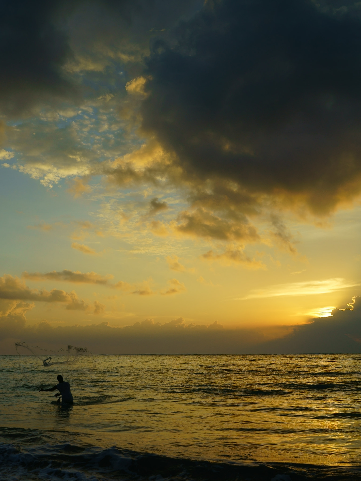 Sony a7 II + Sony FE 28mm F2 sample photo. Fisherman photography