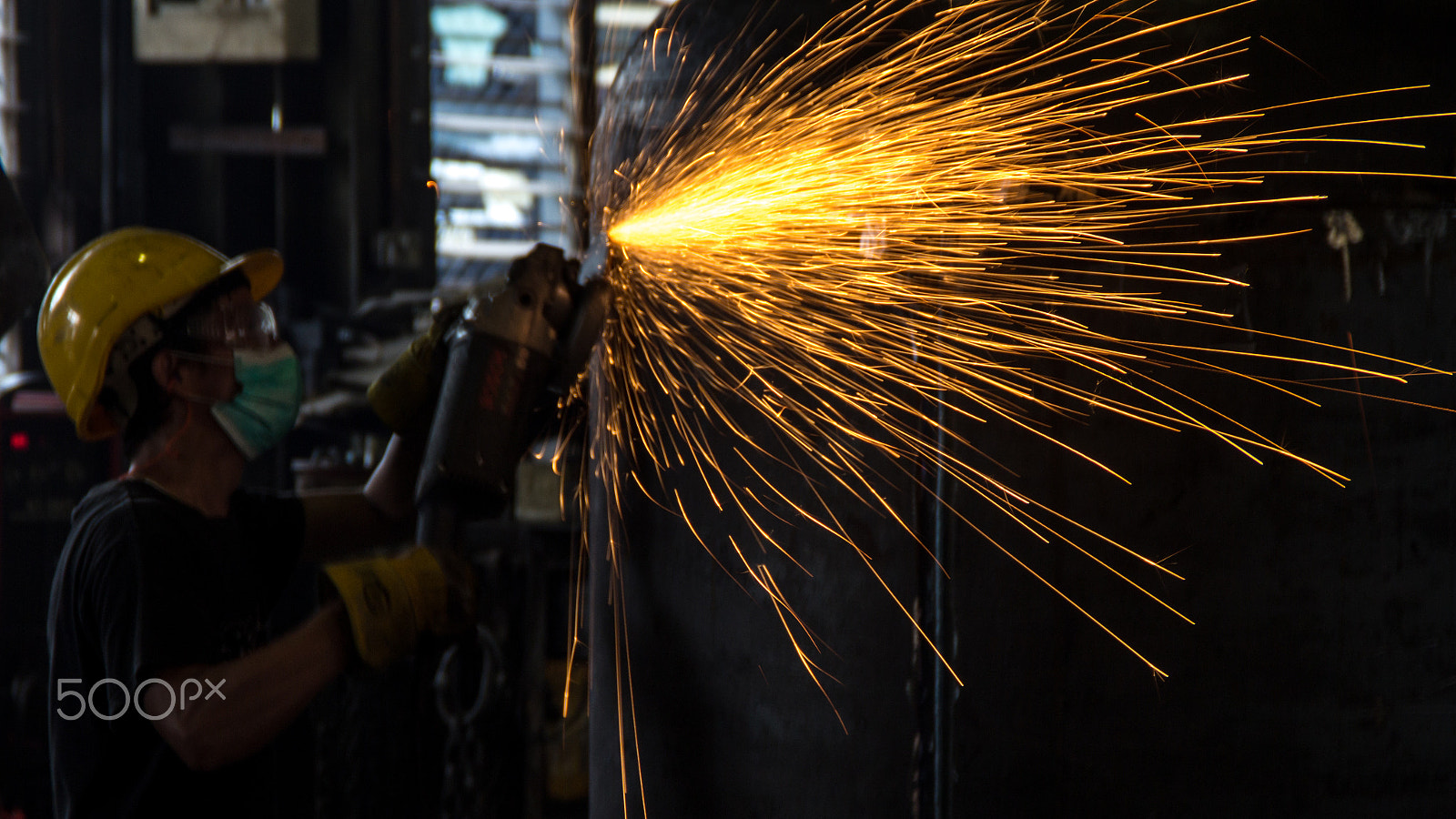 Canon EOS 600D (Rebel EOS T3i / EOS Kiss X5) sample photo. A steel worker doing a finishing job photography