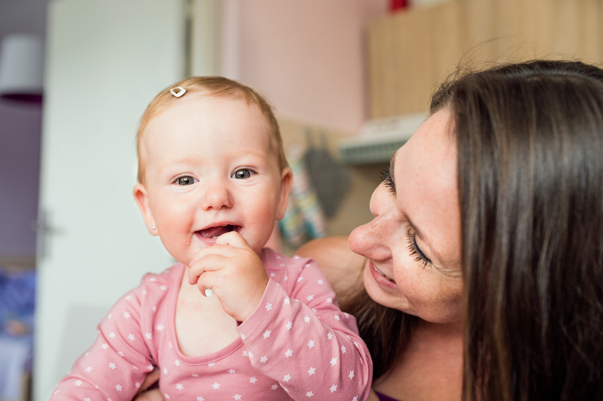 Nikon D4S + Sigma 35mm F1.4 DG HSM Art sample photo. Close up of mother holding her cute baby daughter photography