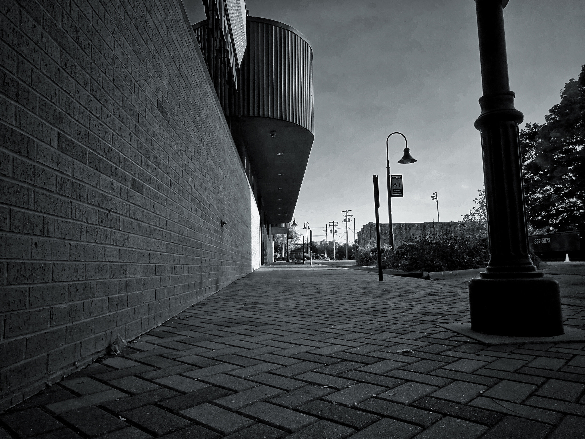Sony 25-500mm F3.5-6.5 sample photo. Empty city sidewalk photography