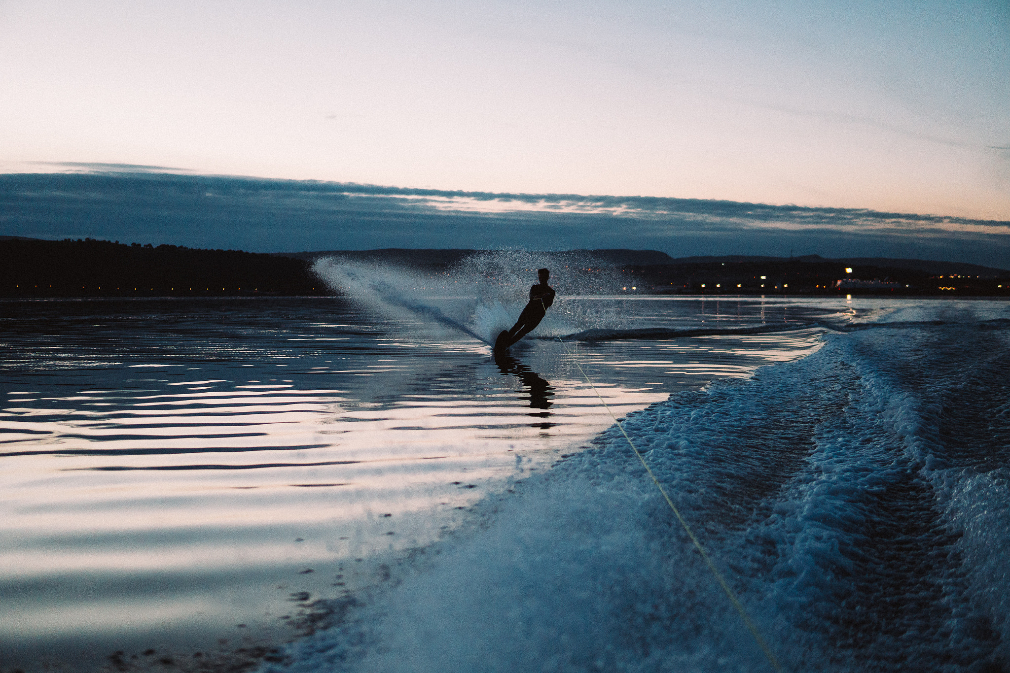 Sony a6300 + 30mm F1.4 DC DN | Contemporary 016 sample photo. Monoskiing at sundown. photography