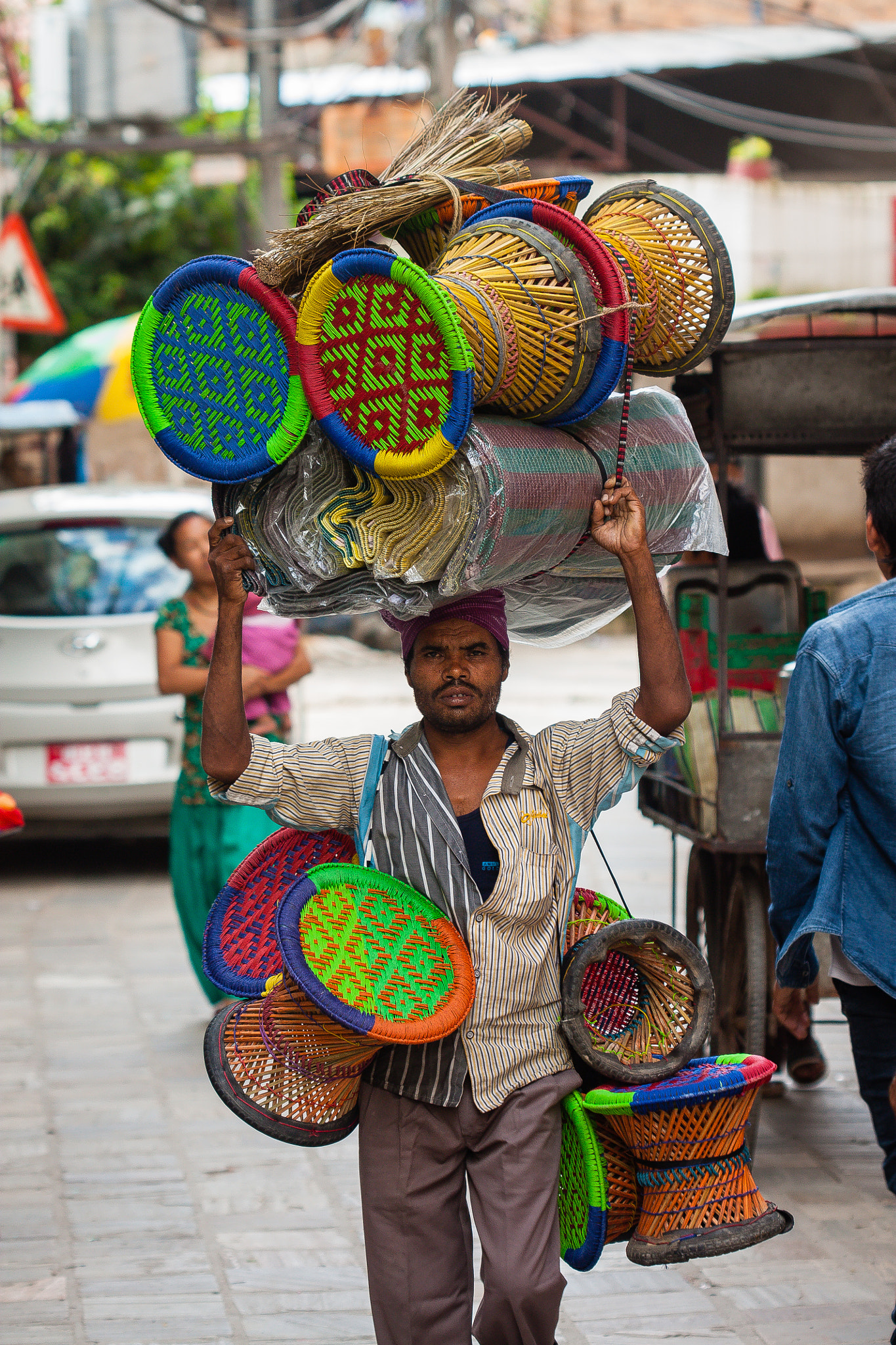 Canon EF 100mm F2.8 Macro USM sample photo. Man selling chairs photography