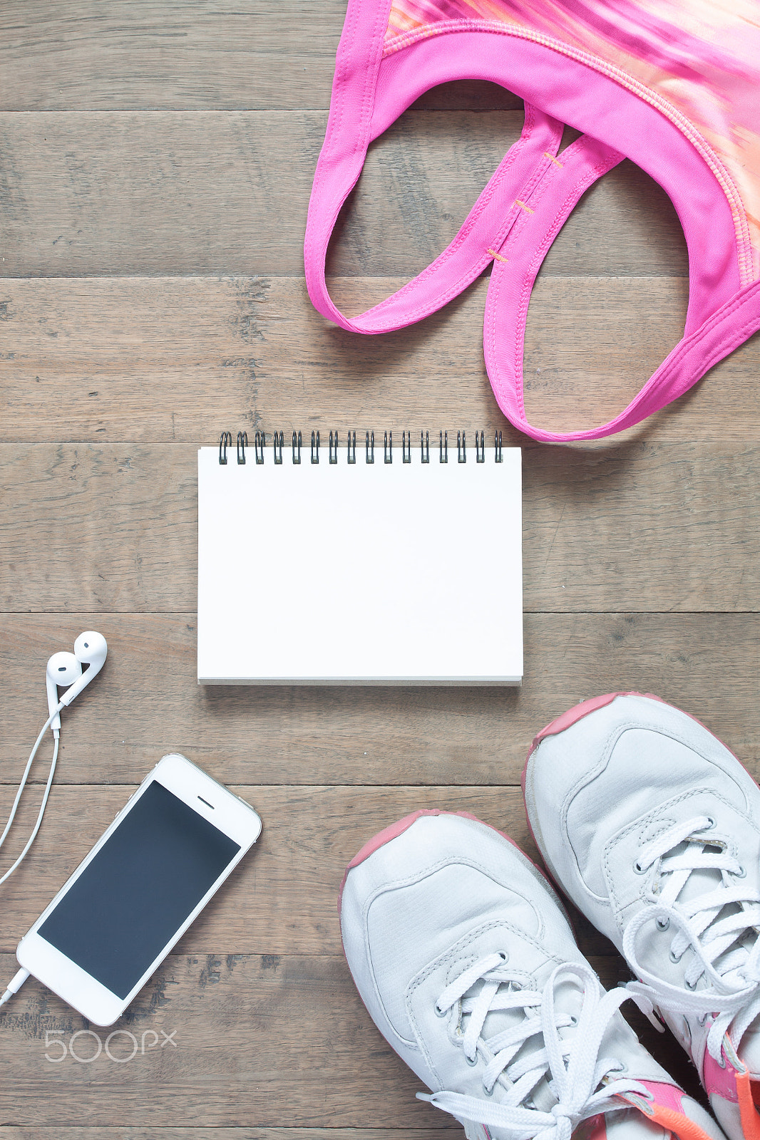 Canon EOS 500D (EOS Rebel T1i / EOS Kiss X3) sample photo. Flat lay of empty notebook, pink color sport bra, sport equipmen photography