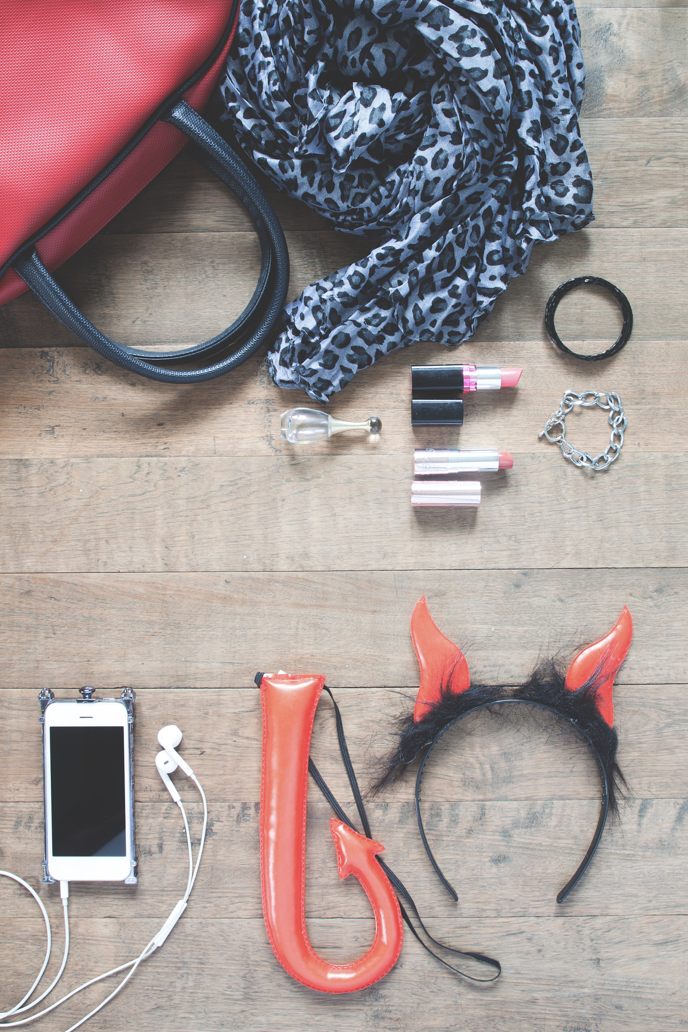 Flat lay photography with Halloween accessories, cosmetics, esse