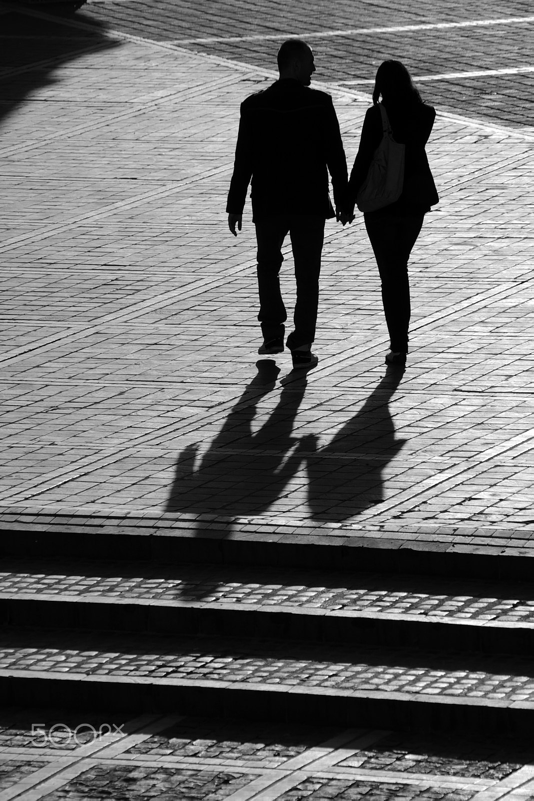 Pentax K200D sample photo. Man and woman walking hand by hand in brasov. photography