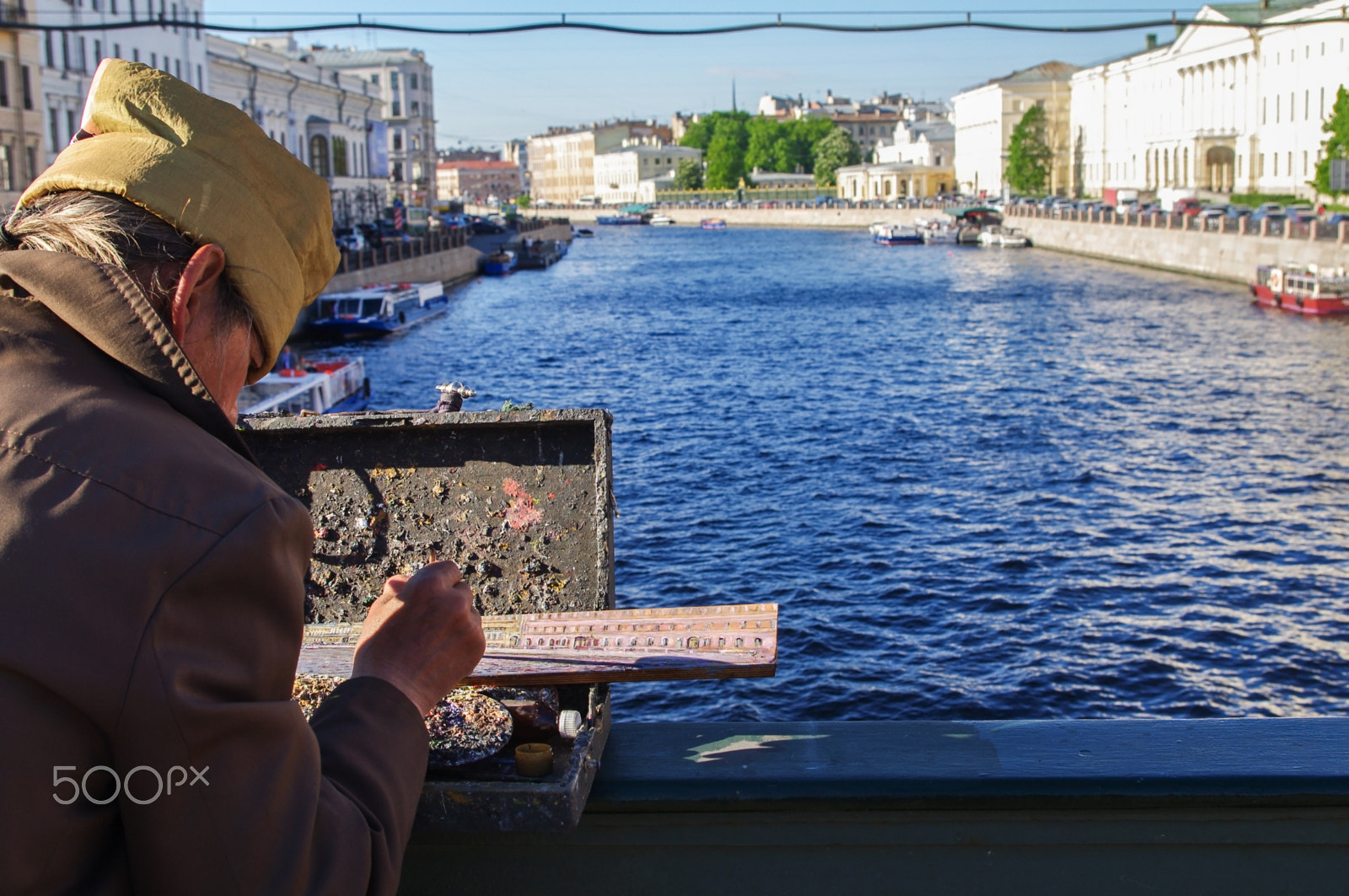 Pentax K-7 + smc PENTAX-DA L 18-55mm F3.5-5.6 sample photo. St. petersburg, russia - may 22, 2014: street artist paints river landscape on the bridge over... photography