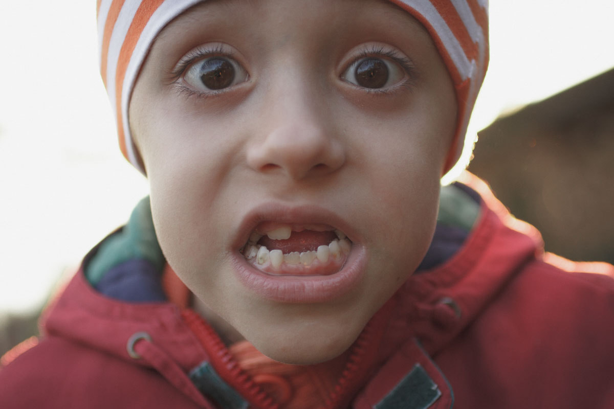 Canon EF 50mm F2.5 Macro sample photo. Portrait of a child. photography