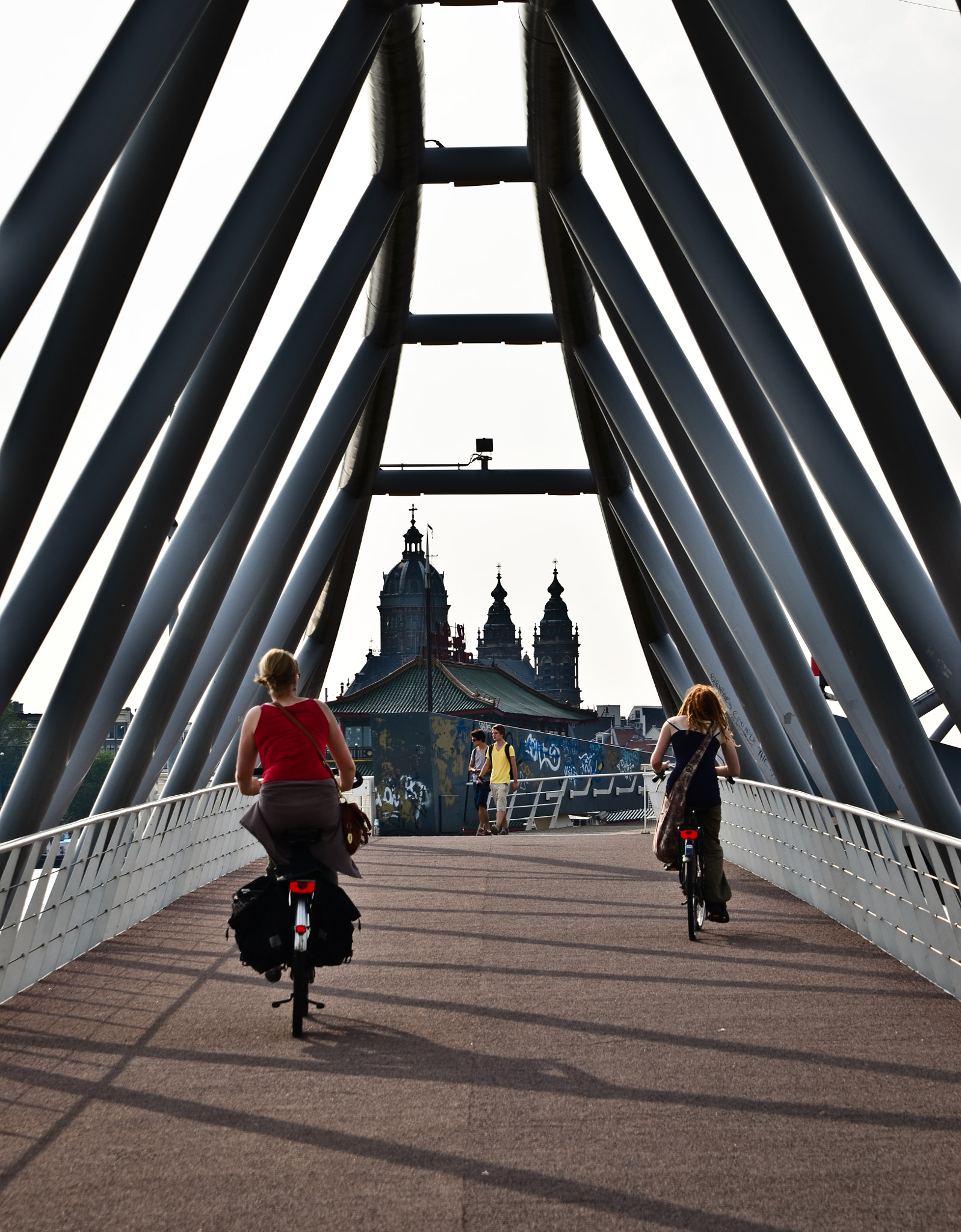Sigma 24-70mm F2.8 EX DG HSM sample photo. Cyclist on the bridge photography