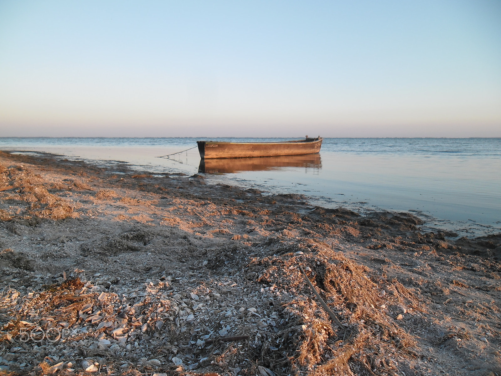 Samsung ES90/ ES91 sample photo. " the boat is lit by the rays of the sun "... photography