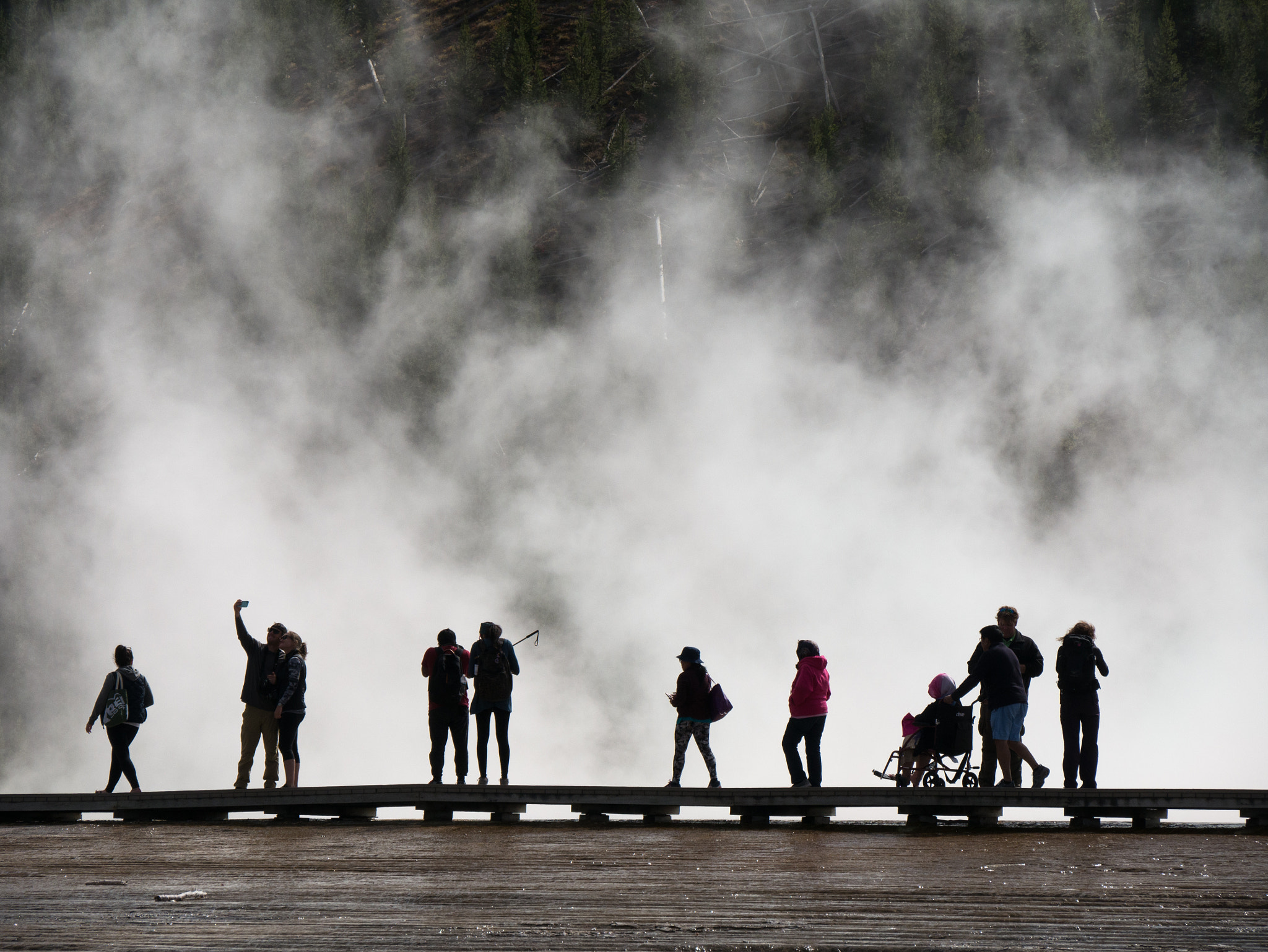 Panasonic Lumix DMC-GX7 sample photo. People have fun at yellowstone np photography
