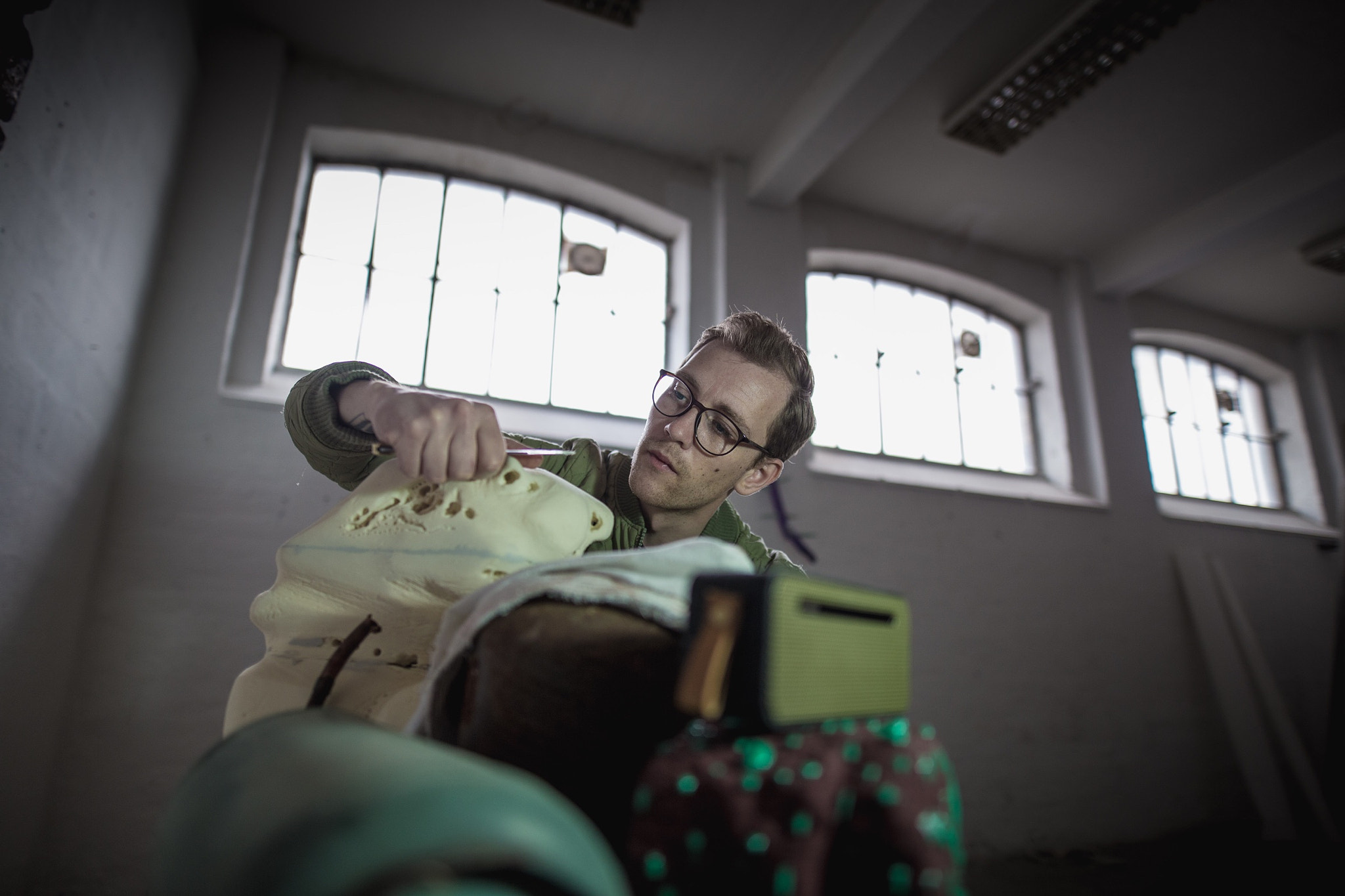 Canon EOS 6D sample photo. Kristian jon larsen working on a foam sculpture, before burning it's surface photography