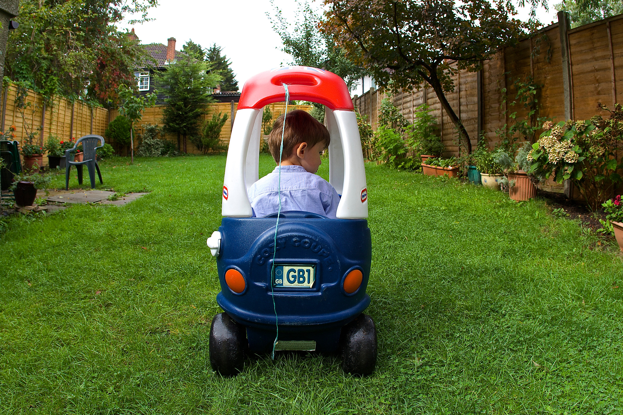 Canon EOS 700D (EOS Rebel T5i / EOS Kiss X7i) + Canon EF 15mm F2.8 Fisheye sample photo. Little boy and his little car photography