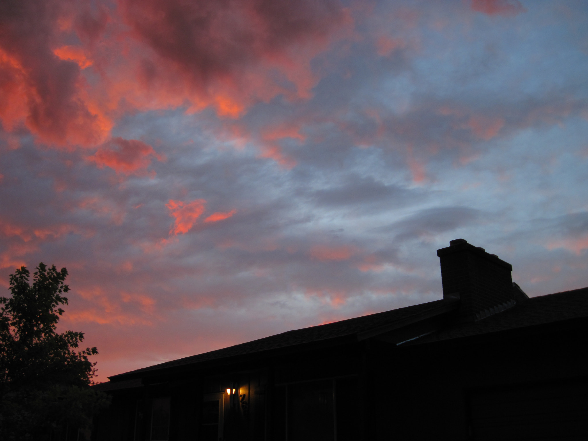 Canon PowerShot A1100 IS sample photo. Sunset over house photography