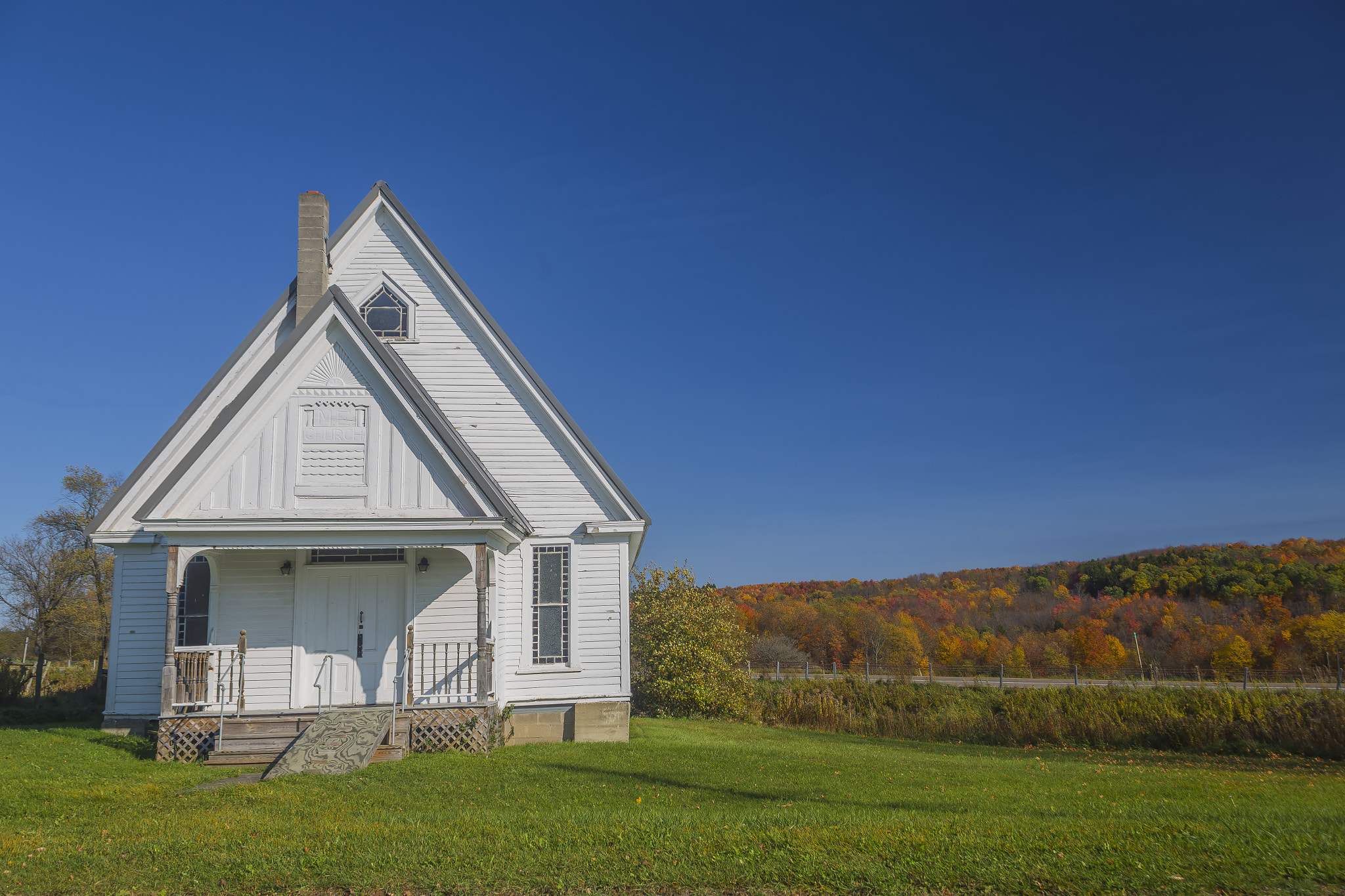 Canon EOS 6D + Canon EF 20-35mm F3.5-4.5 USM sample photo. Little white church photography