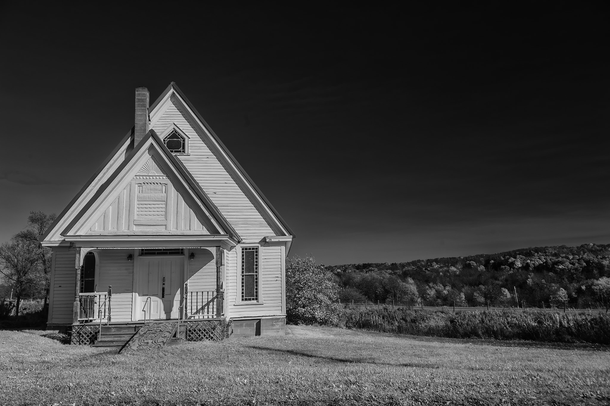 Canon EOS 6D + Canon EF 20-35mm F3.5-4.5 USM sample photo. Little white church black and white photography