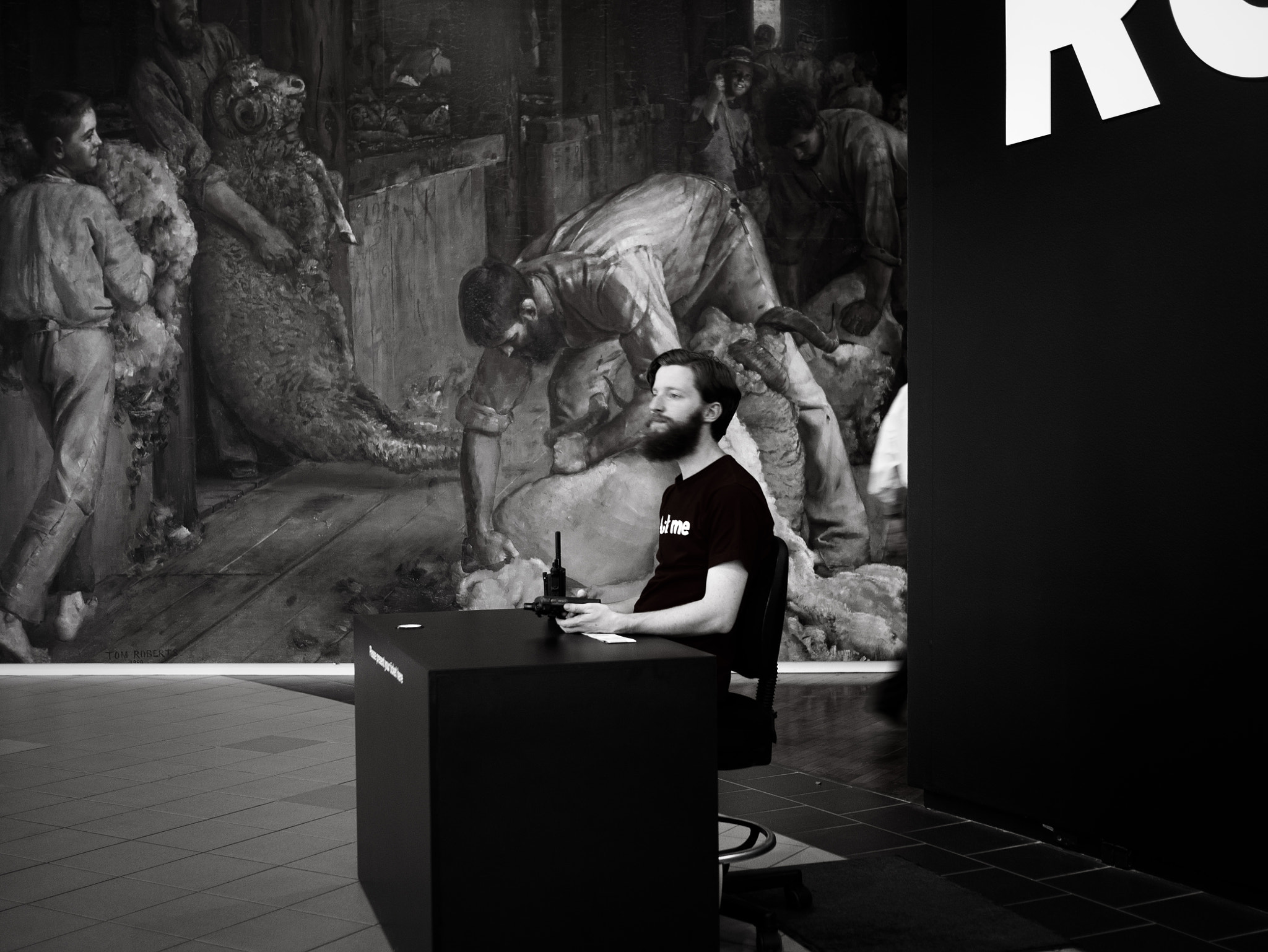 Panasonic Lumix DMC-GX7 + Panasonic Lumix G 20mm F1.7 ASPH sample photo. Bearded boy at the art exhibition photography