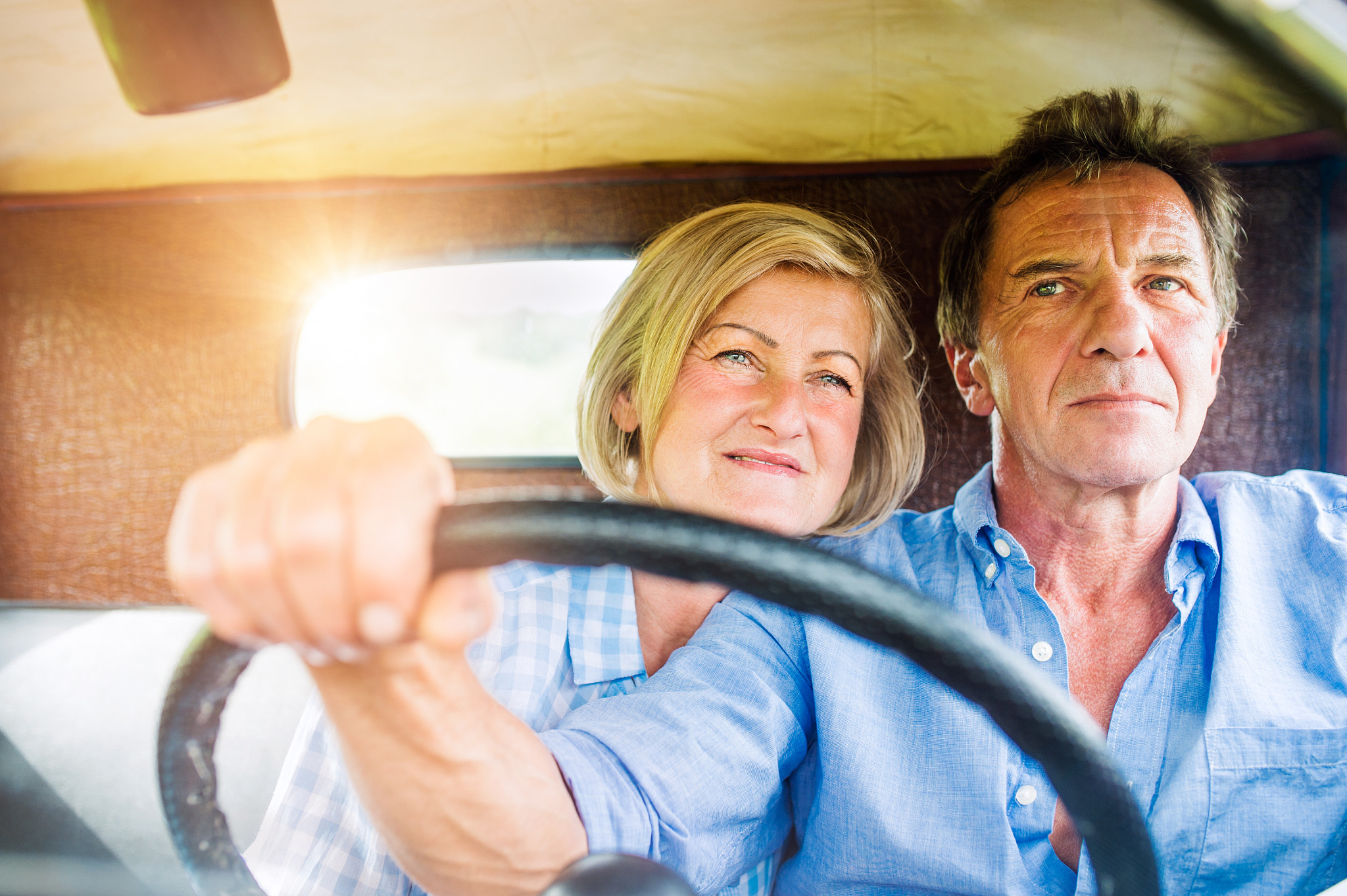 Nikon D4S + Sigma 35mm F1.4 DG HSM Art sample photo. Close up of senior couple inside a pickup truck photography