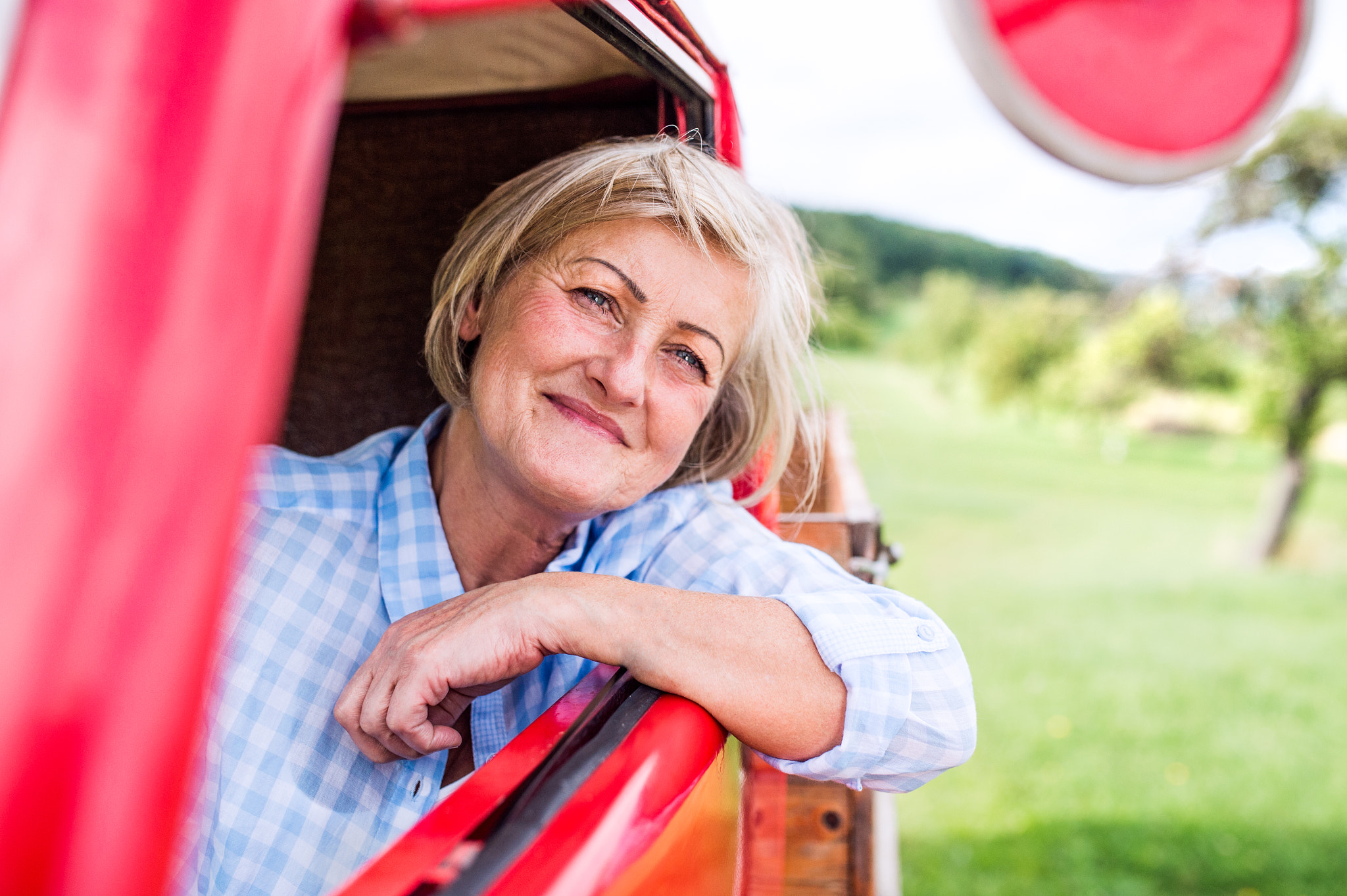 Nikon D4S + Sigma 35mm F1.4 DG HSM Art sample photo. Close up of senior woman inside vintage pickup truck photography