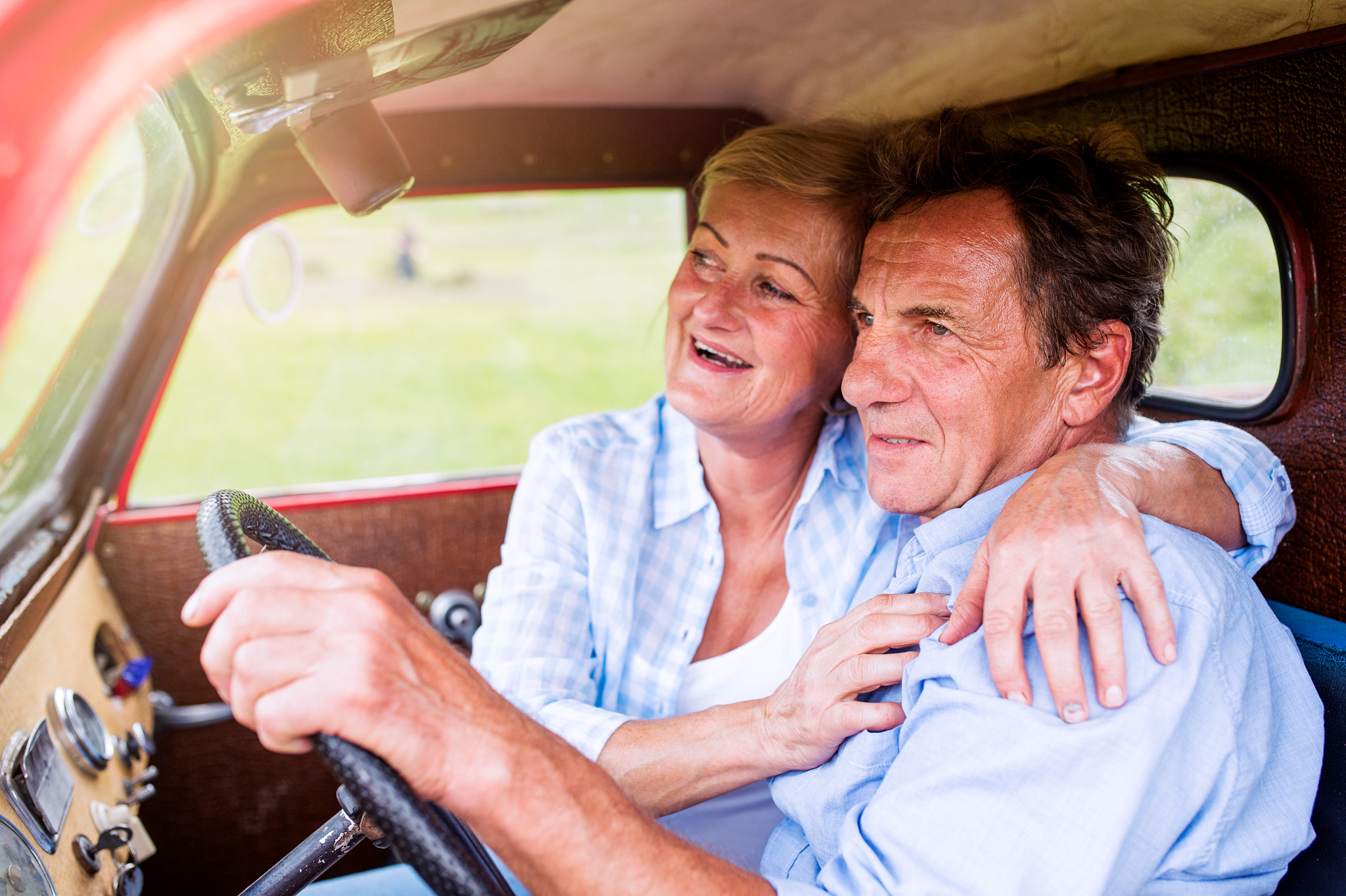 Nikon D4S + Sigma 35mm F1.4 DG HSM Art sample photo. Close up of senior couple inside a pickup truck photography