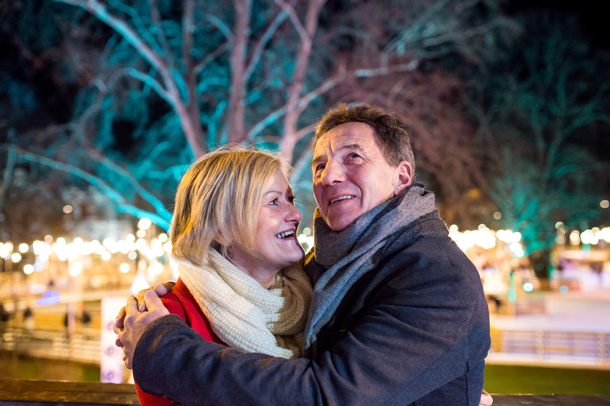 Nikon D4S + Sigma 35mm F1.4 DG HSM Art sample photo. Senior couple walking in night city. winter, historical building photography