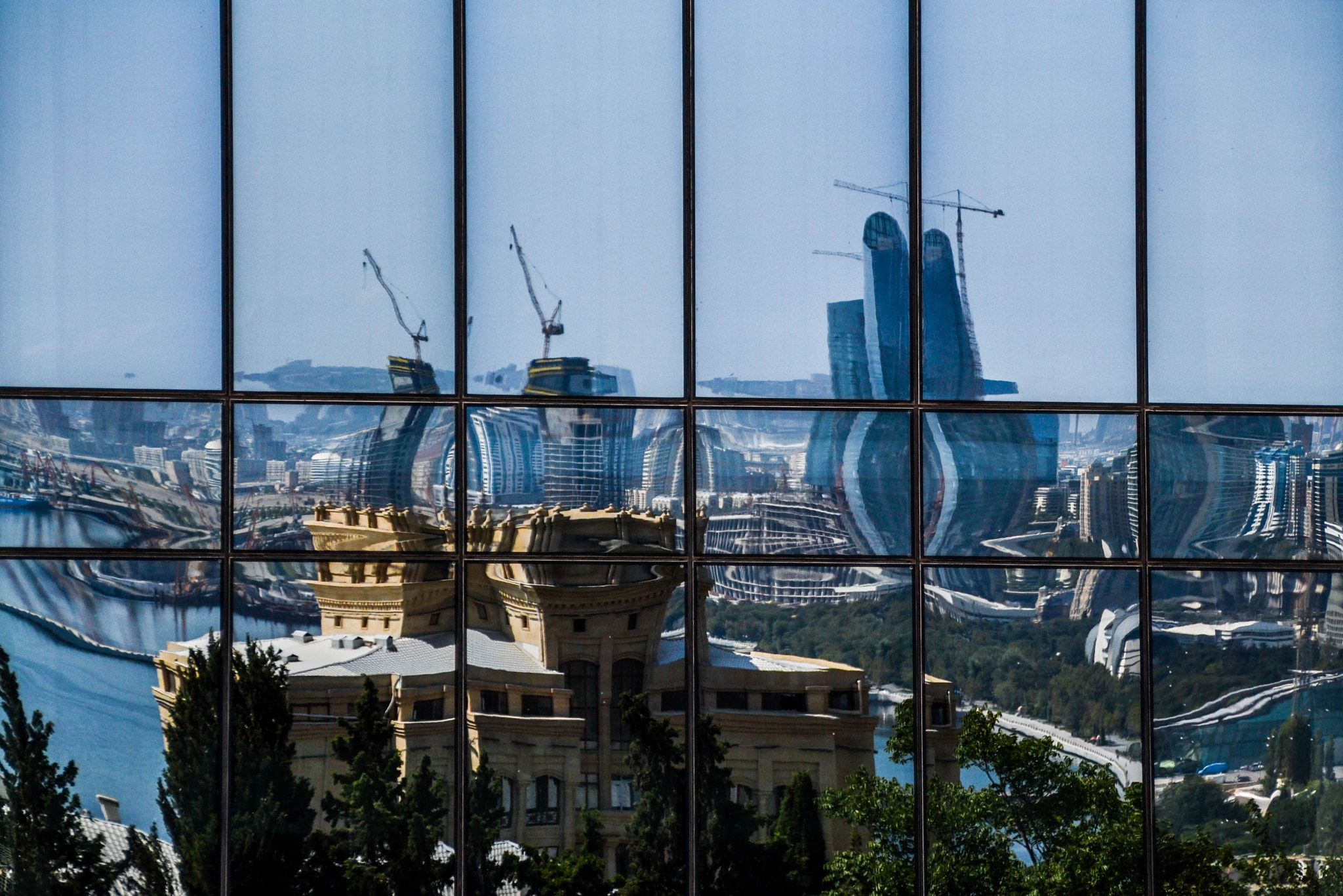 Sigma 28-300mm F3.5-6.3 DG Macro sample photo. The reflection of baku photography