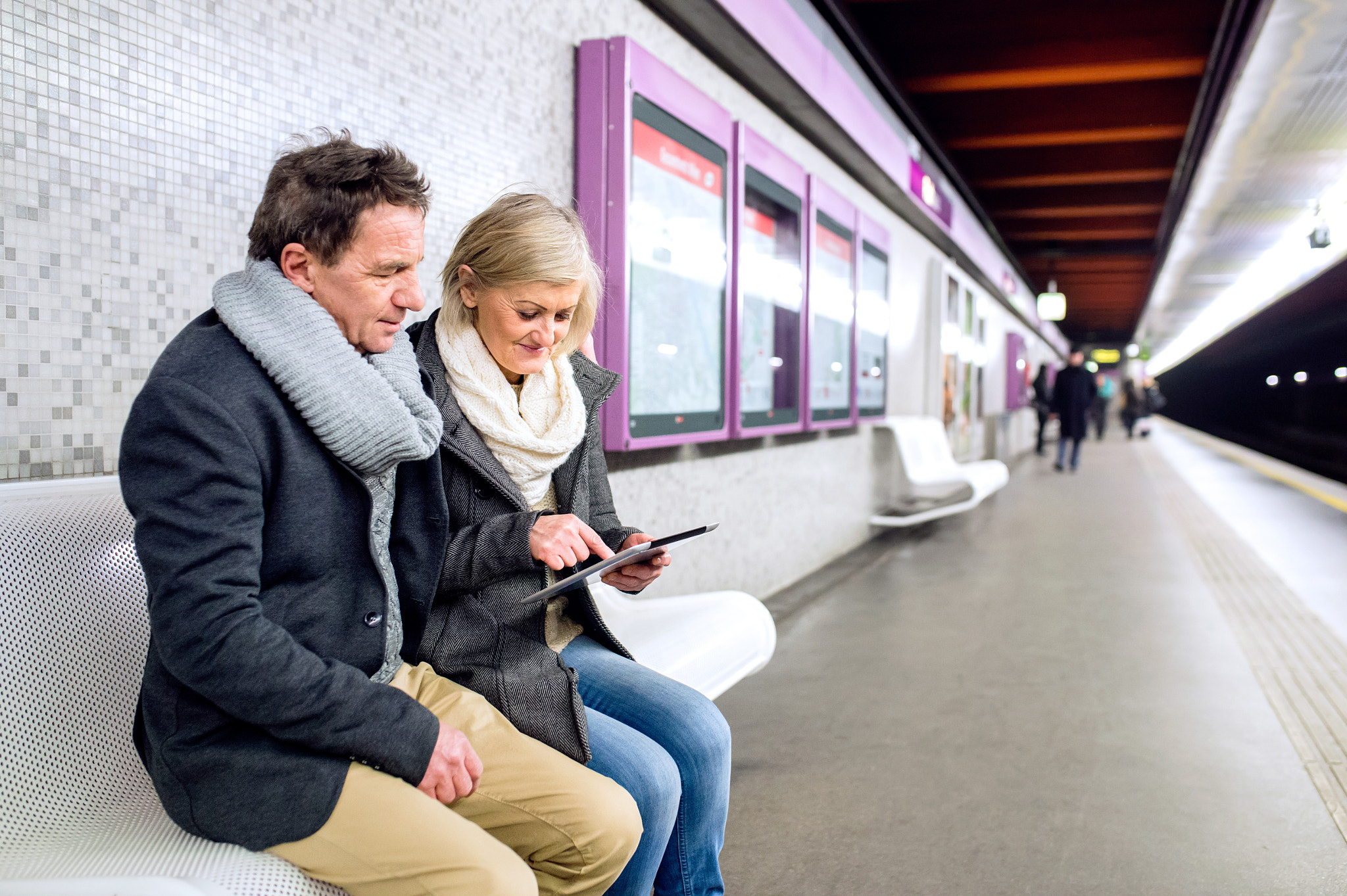 Nikon D4S + Sigma 35mm F1.4 DG HSM Art sample photo. Senior couple sitting at the underground platform, waiting photography