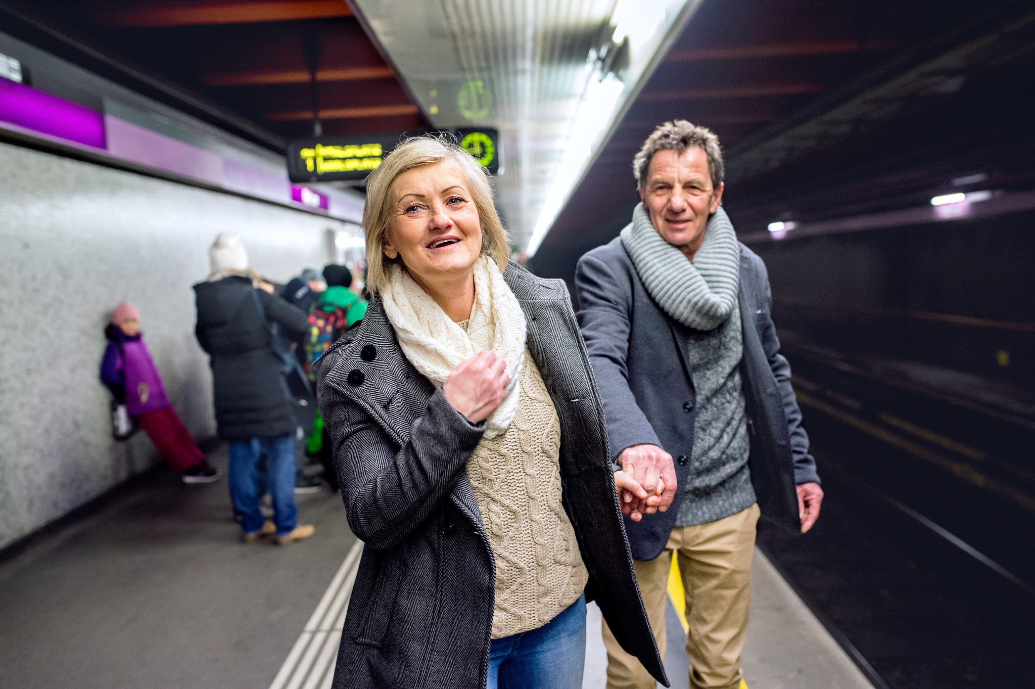 Nikon D4S + Sigma 35mm F1.4 DG HSM Art sample photo. Senior couple at the underground platform, waiting photography