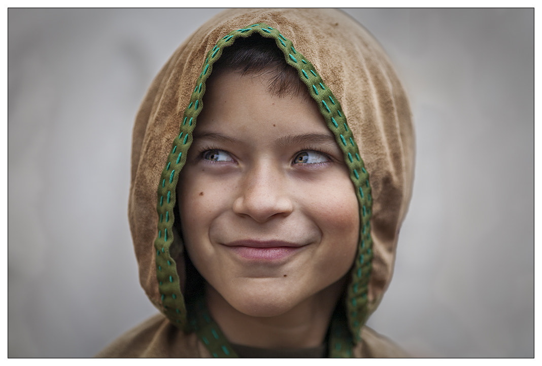 Canon EOS 5D + Canon EF 200mm f/2.8L sample photo. Hooded boy photography