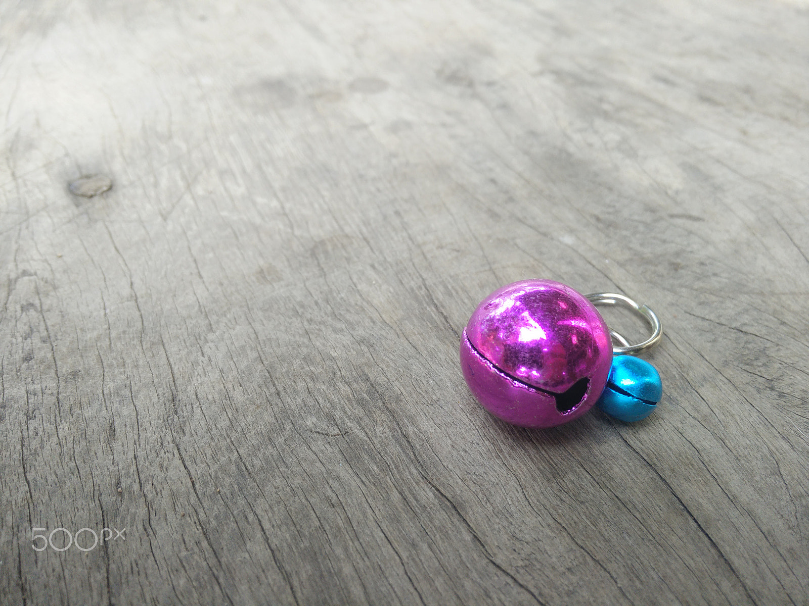 OPPO Find7 sample photo. Small bell put on wooden table photography