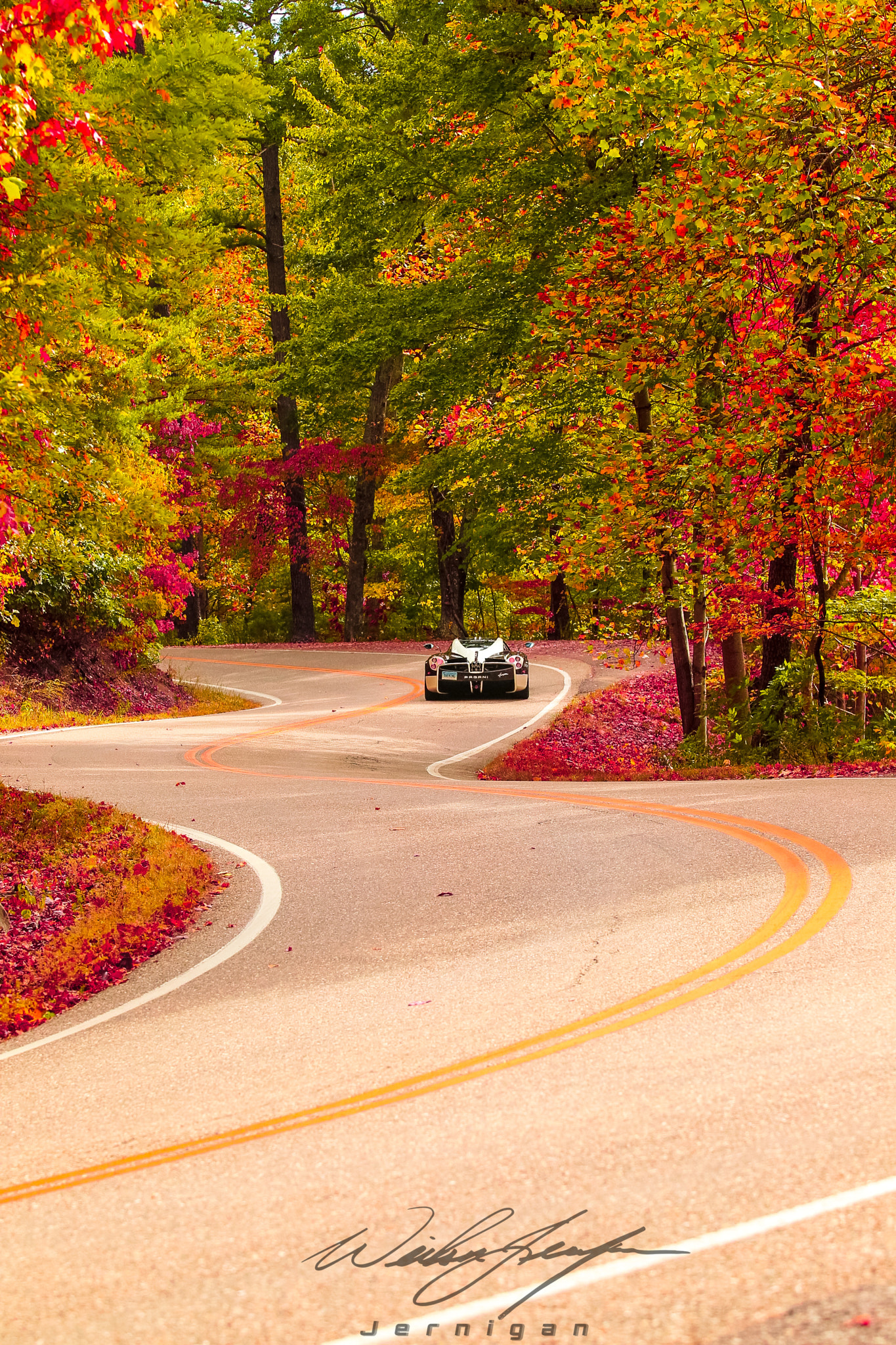 Canon EOS-1D Mark IV sample photo. At the end of the rainbow road is a pagani photography