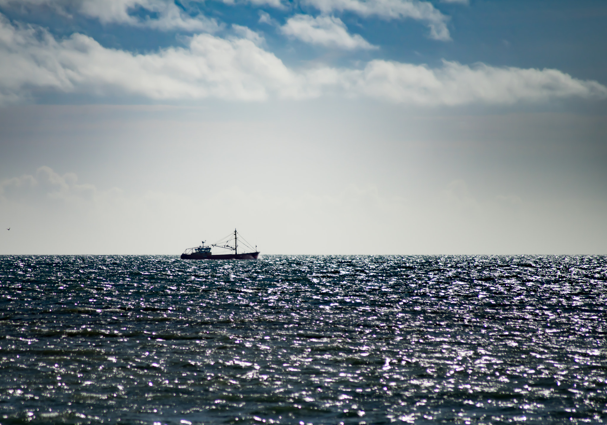 Nikon D810 + Sigma 50-150mm F2.8 EX APO DC HSM II + 1.4x sample photo. Boat on the sea at loughshinny photography