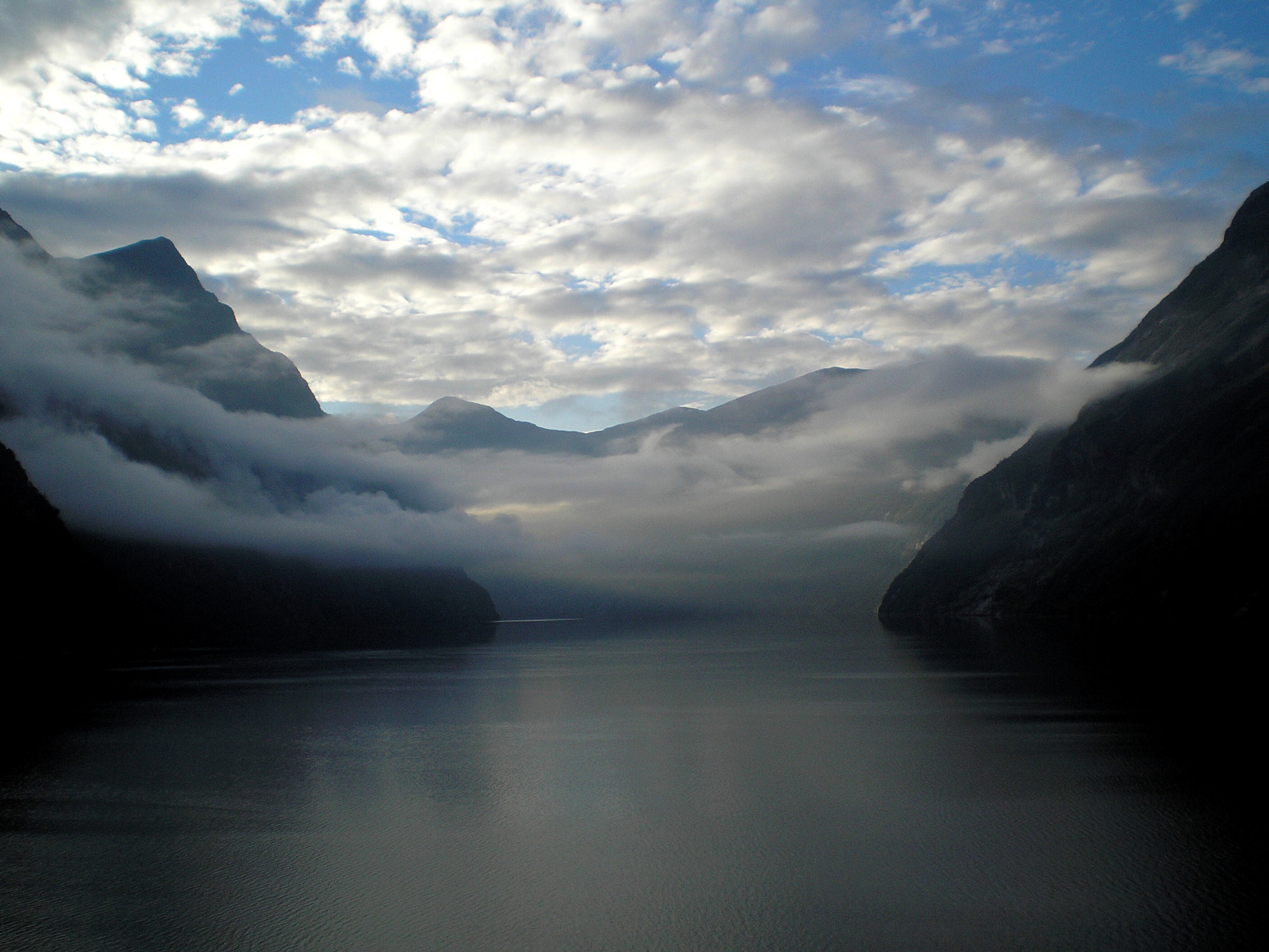 Olympus FE-140,X-725 sample photo. Early morning mist at geirangerfjord - norway photography